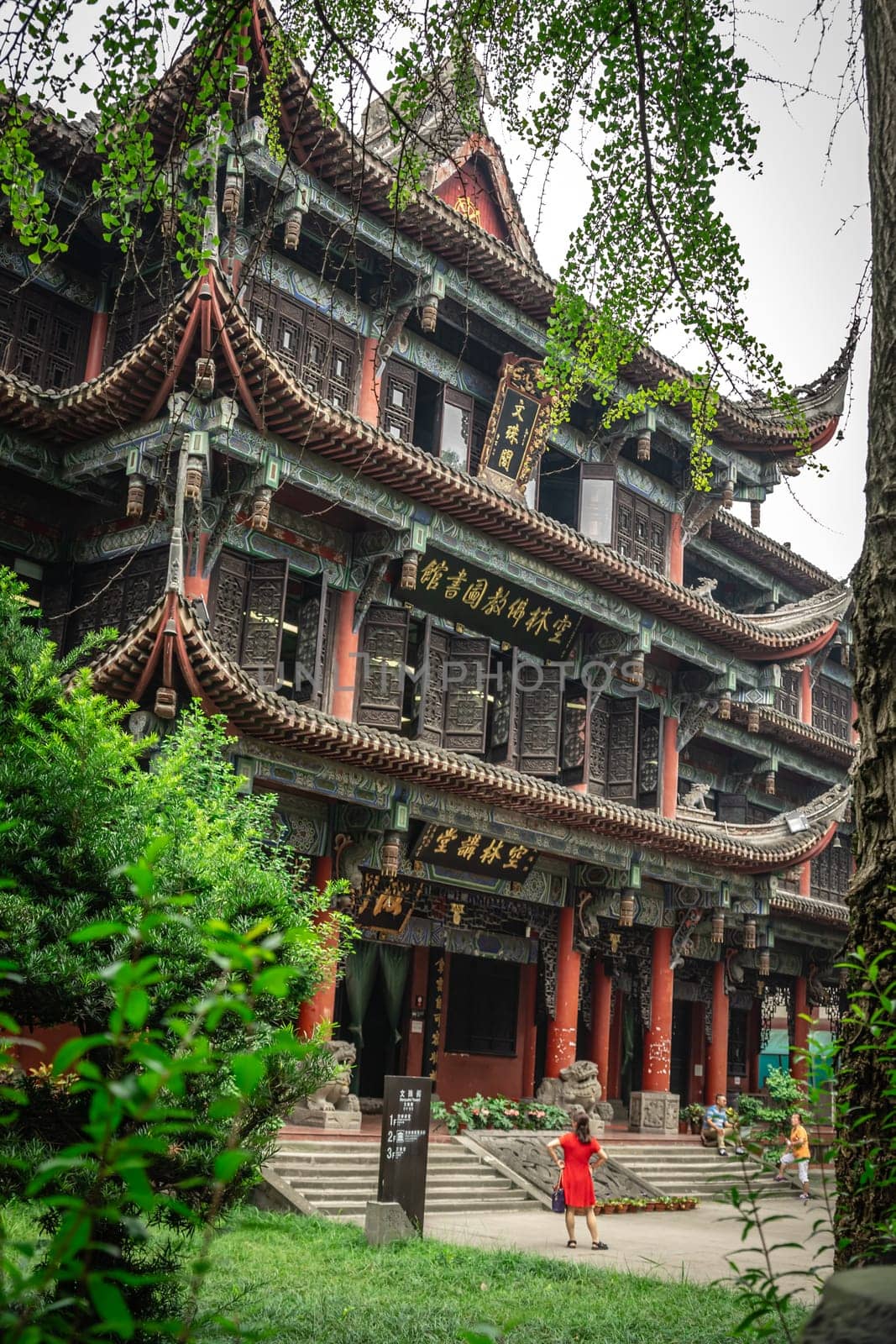 Chengdu, China -  July 2019 : Courtyard and walking path in front of an impressive temple in Wenshu Monastery
