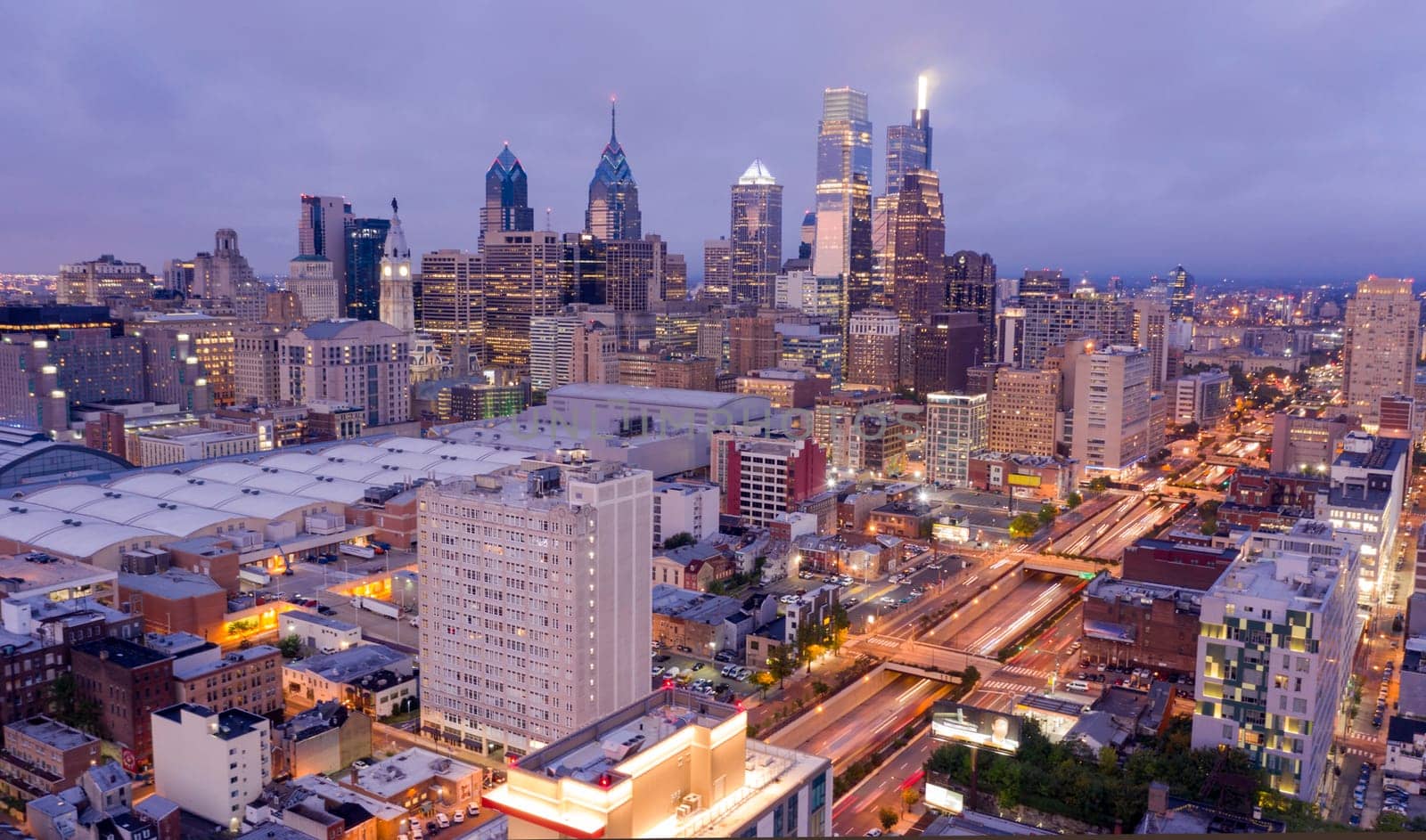 The office lights are bright as night comes to the city center of Philadelphia PA
