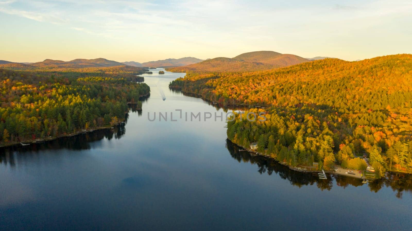 Fall color is more saturated at sunset near Long Lake Adirondack Park Mountains