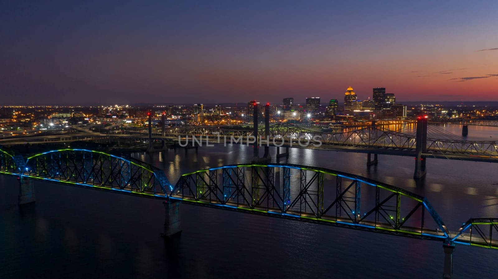 Multi Colors of light hit the Big Four bridge before sunrise around Lousville Kentucky