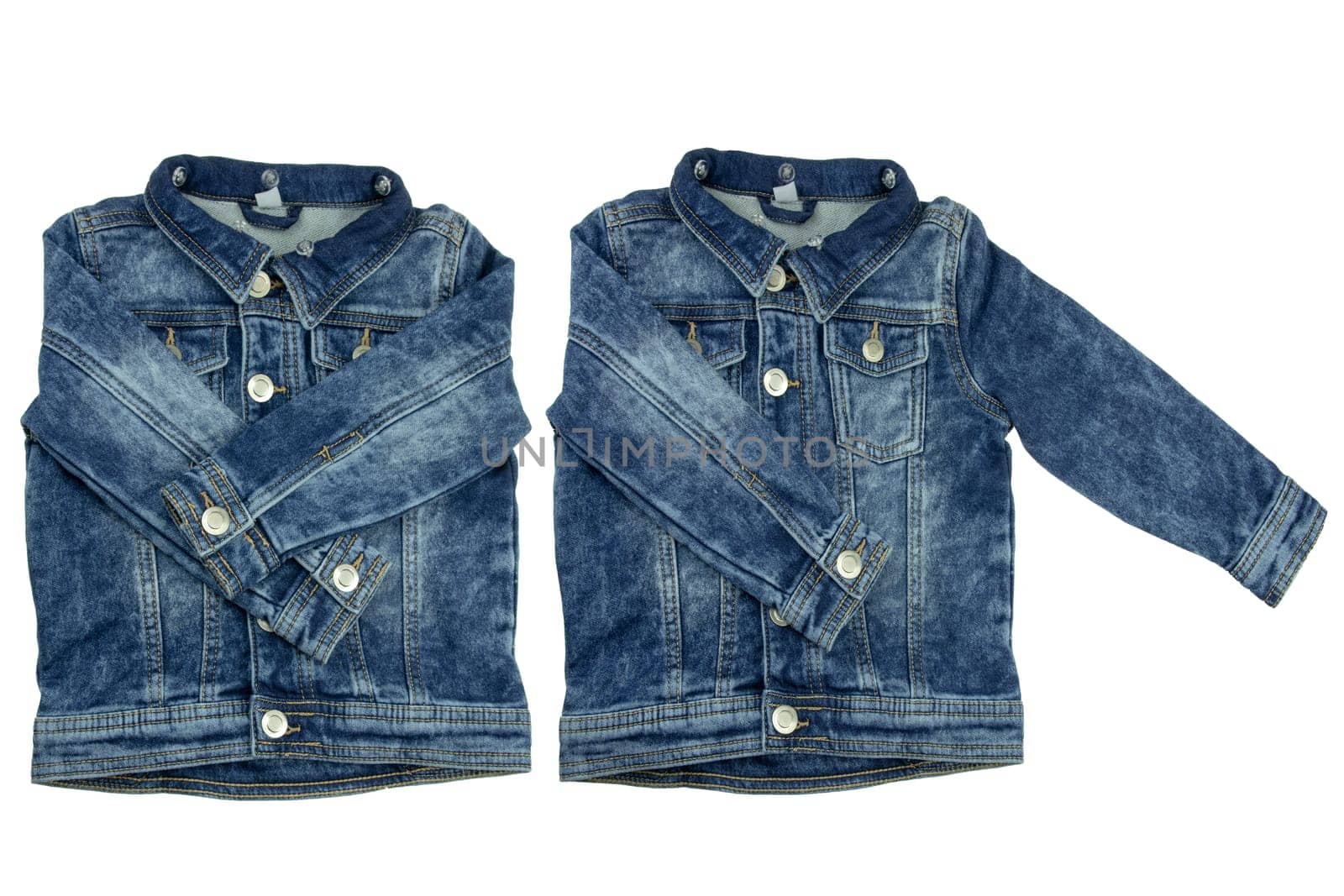 Kids jeans jacket isolated. A stylish fashionable denim blue jacket with a detachable gray hood for the little boy. Children autumn and winter fashion.