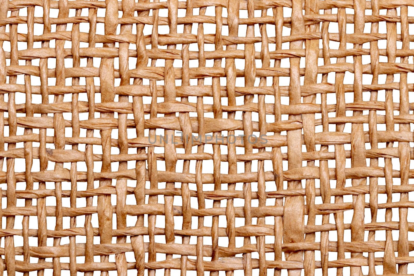 Wicker twigs texture isolated. Close-up of a detail of a handmade wicker lamp shade isolated on a white background. Macro.