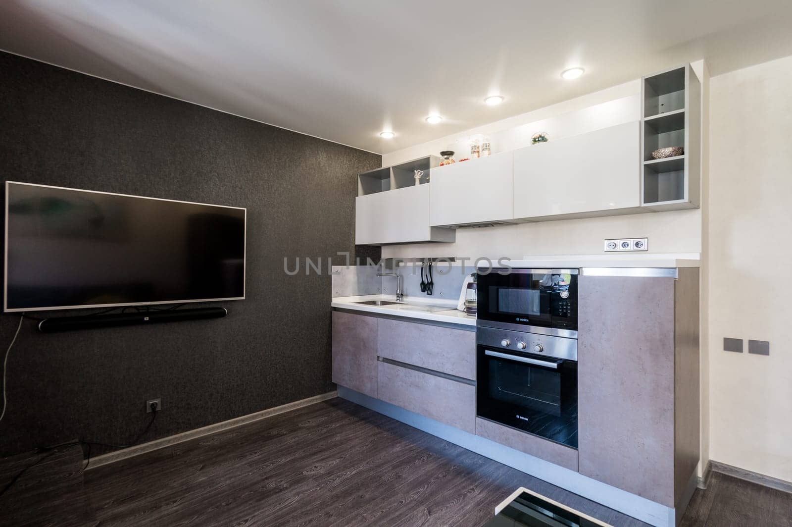 Russia, Moscow- June 11, 2019: interior room apartment. standard repair decoration in hostel. kitchen and dining room