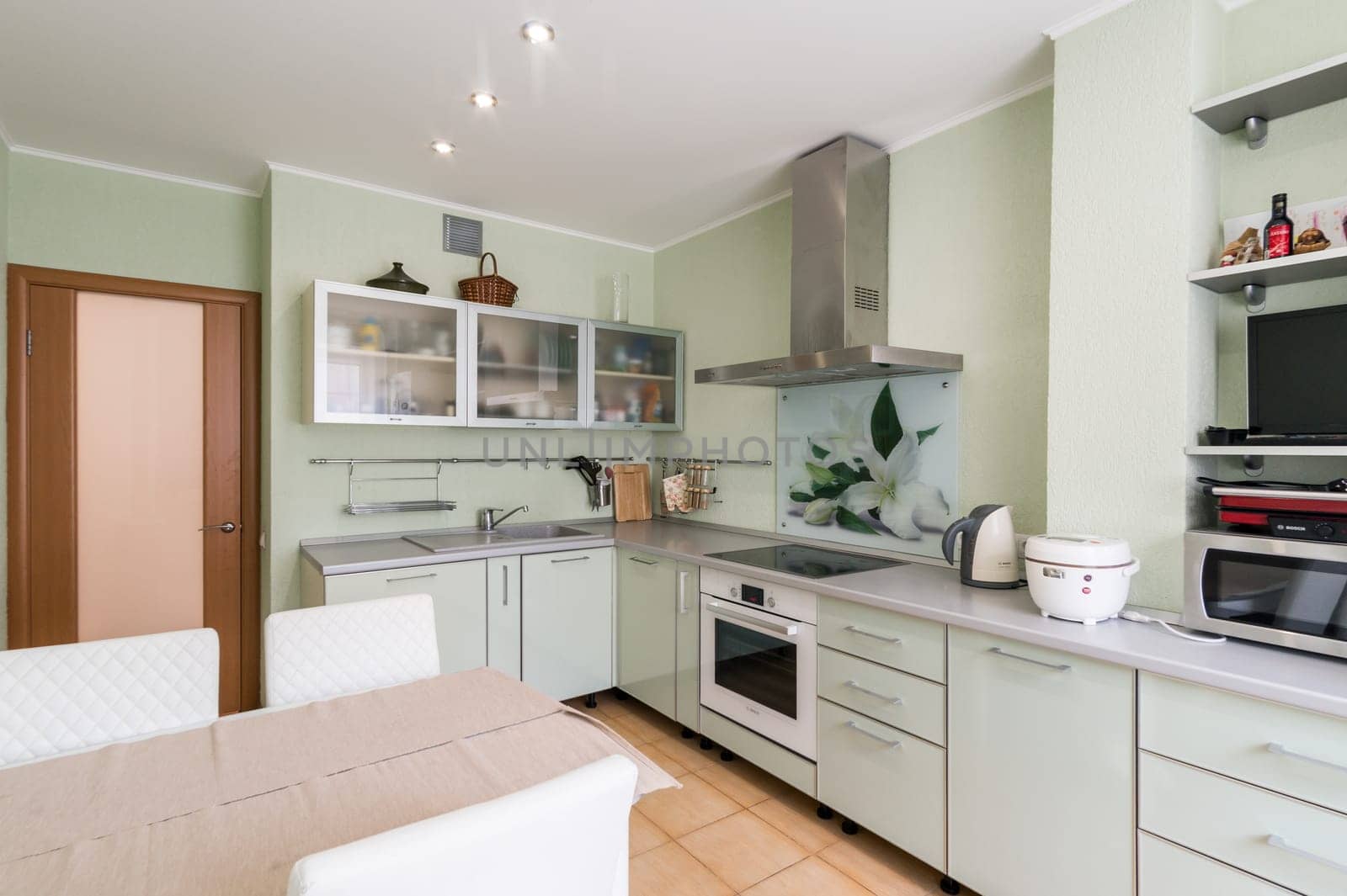 Russia, Moscow- June 11, 2019: interior room apartment. standard repair decoration in hostel. kitchen and dining room