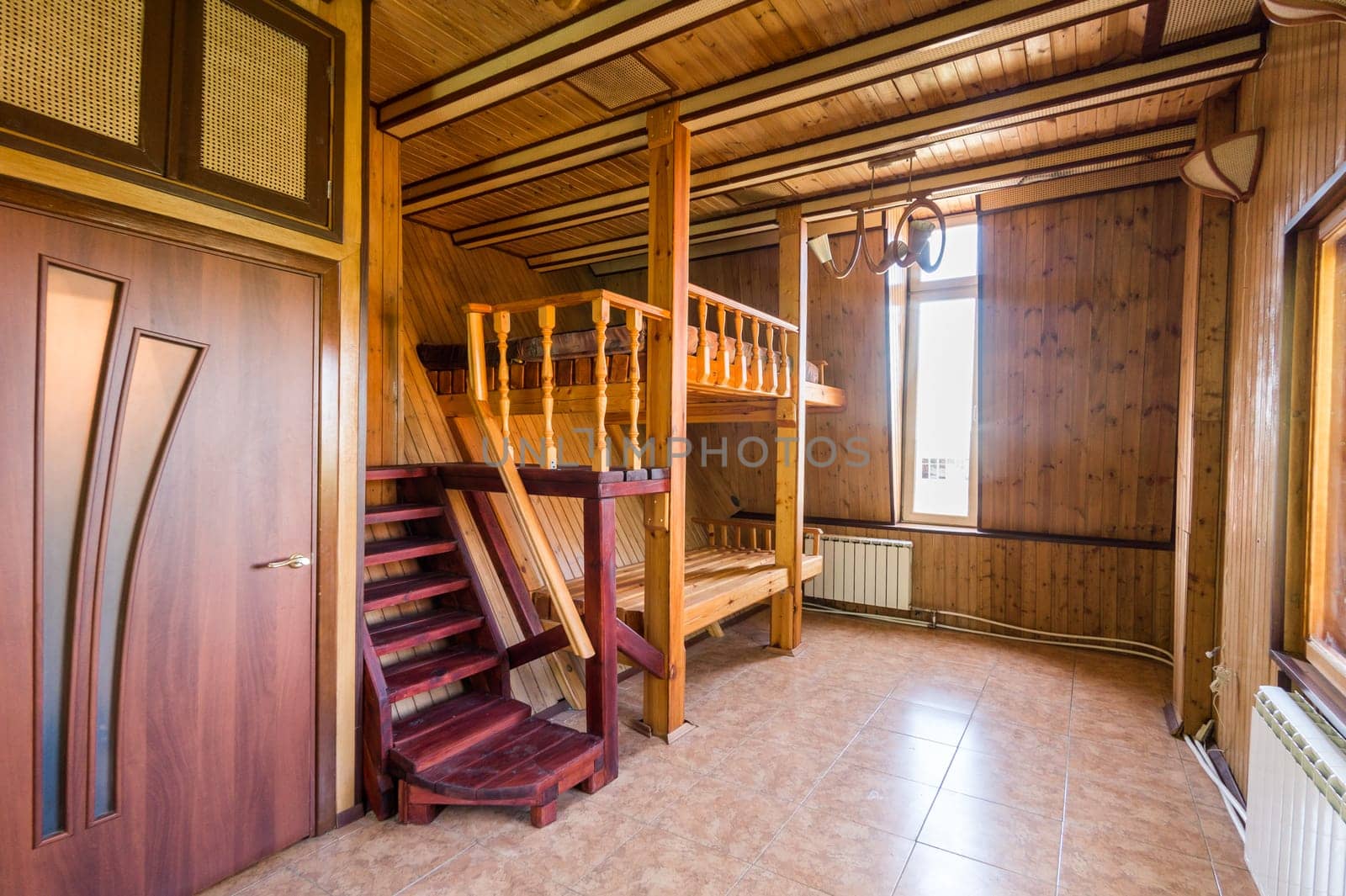 Russia, Moscow- June 11, 2019: interior room apartment. standard repair decoration in hostel. wooden country house