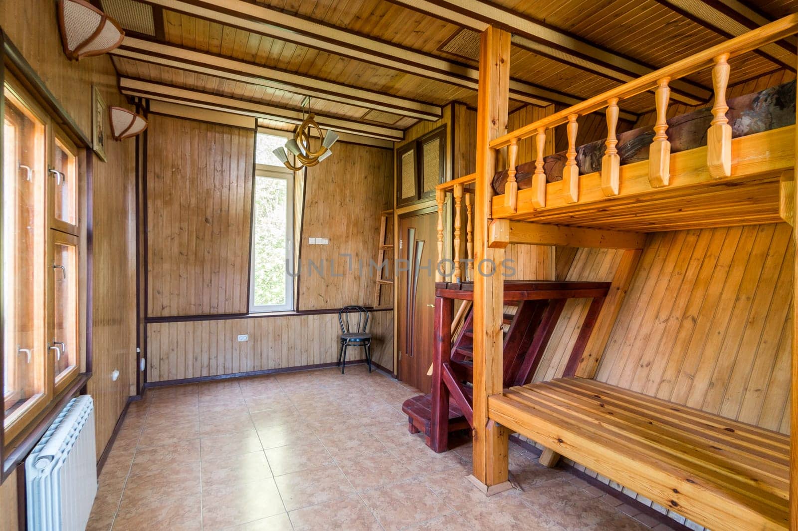 Russia, Moscow- June 11, 2019: interior room apartment. standard repair decoration in hostel. wooden country house