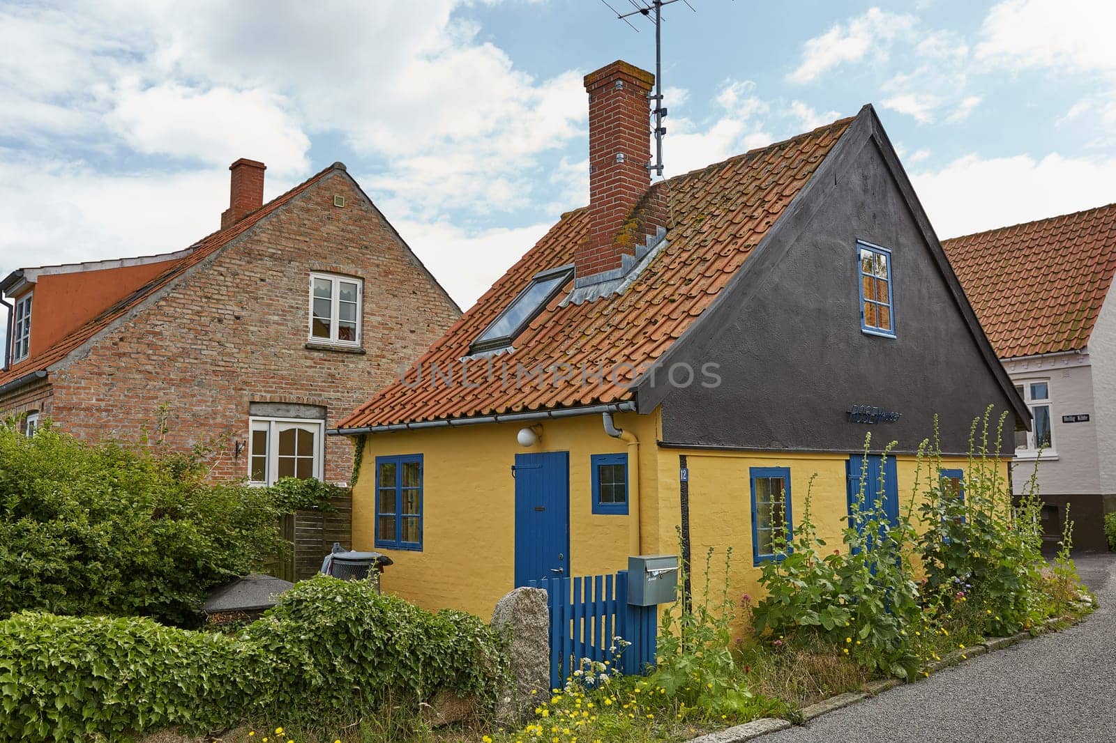 SVANEKE, DENMARK - JULY 4, 2017: Traditional colorful half-timbered houses on Bornholm island in Svaneke Denmark.