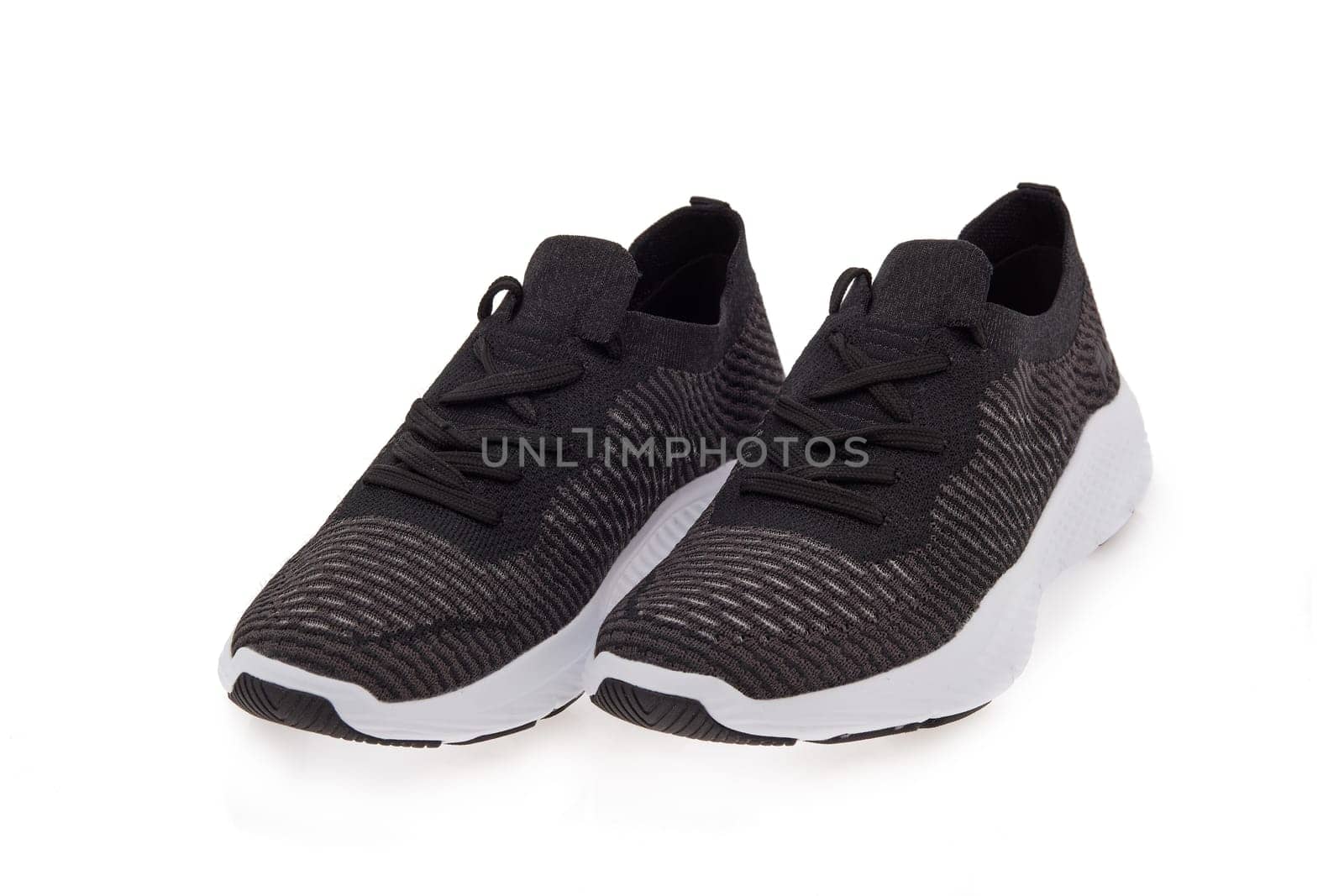 New modern sport running shoes, sneakers or trainers isolated on white background.