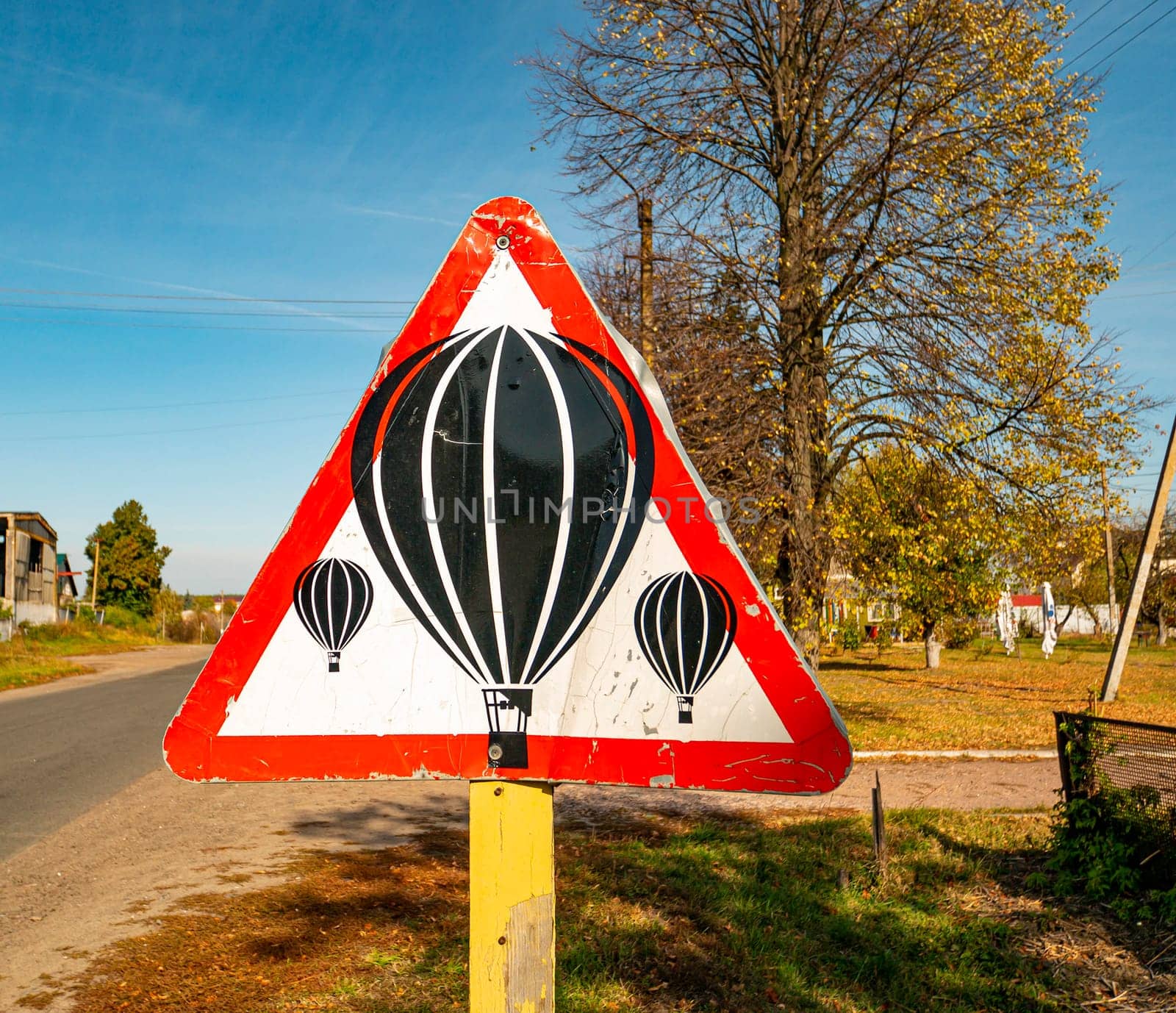 Balloons are flying - warning road sign. Transport.