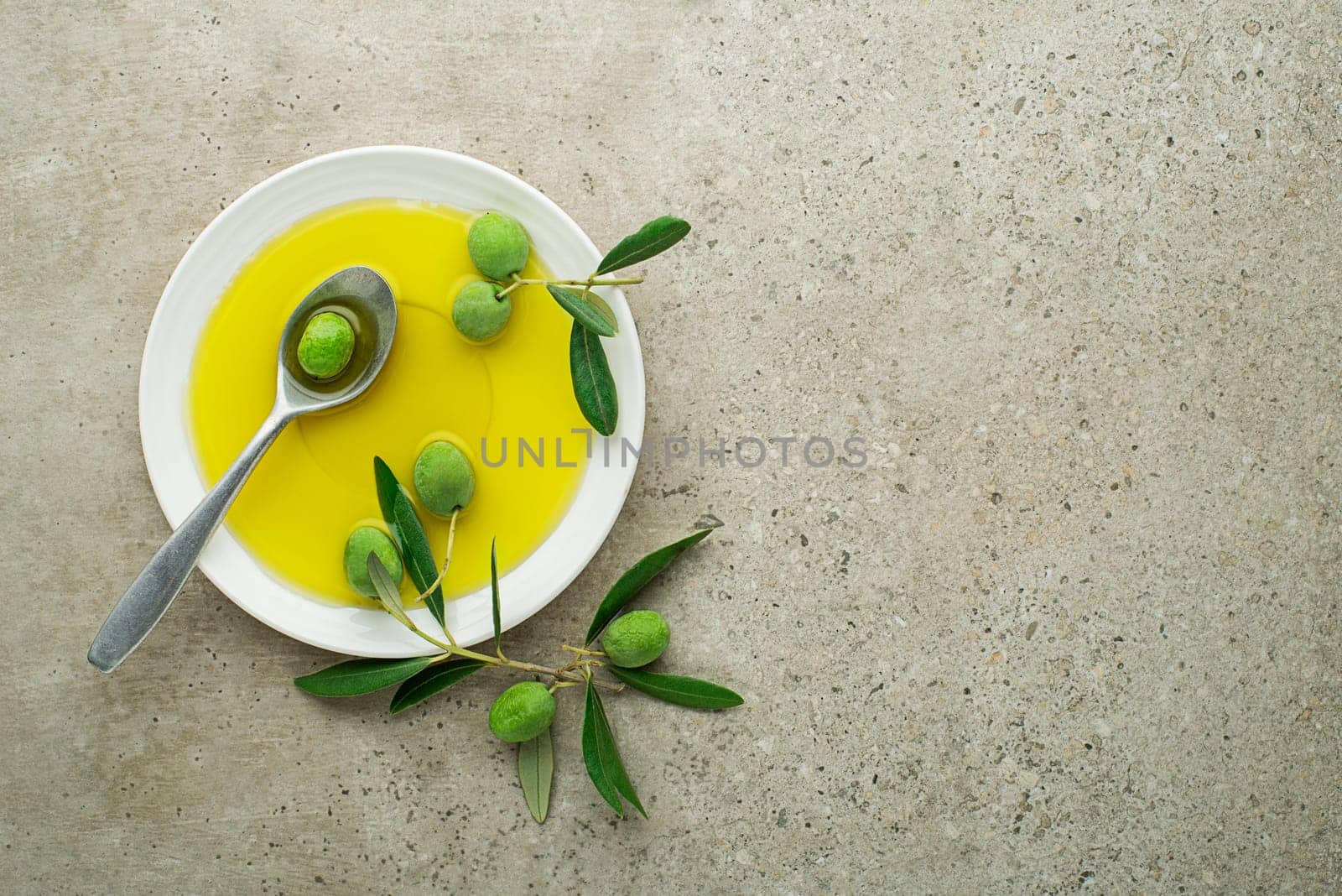 Healthy olive oil with olives ingredients close up. Healthy concept
