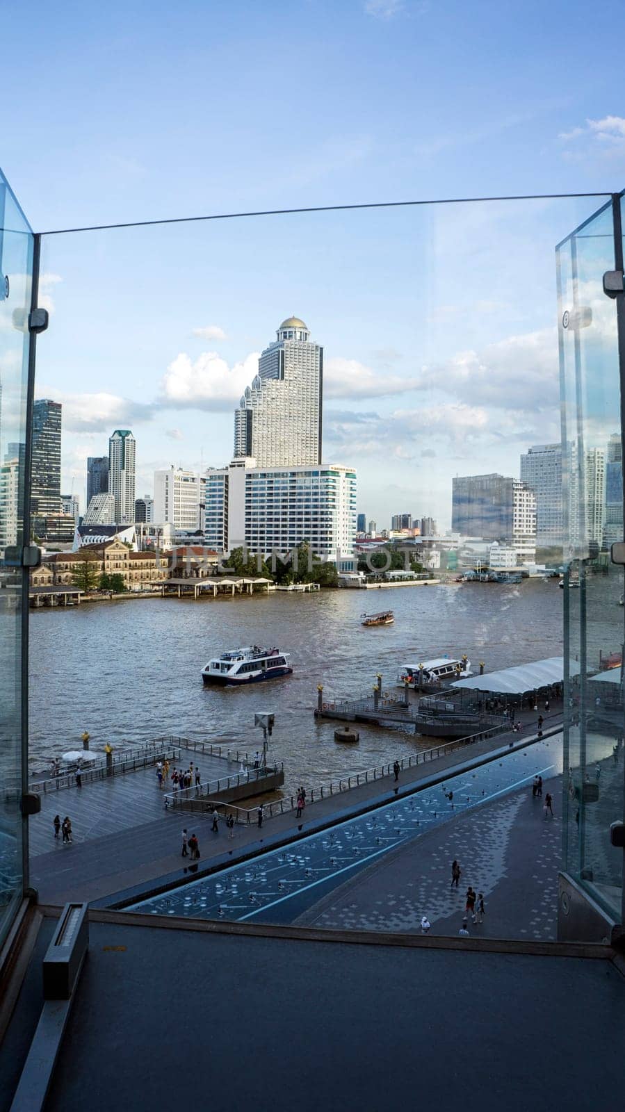 Chao Phrata river Bangkok city modern windows view waterfront