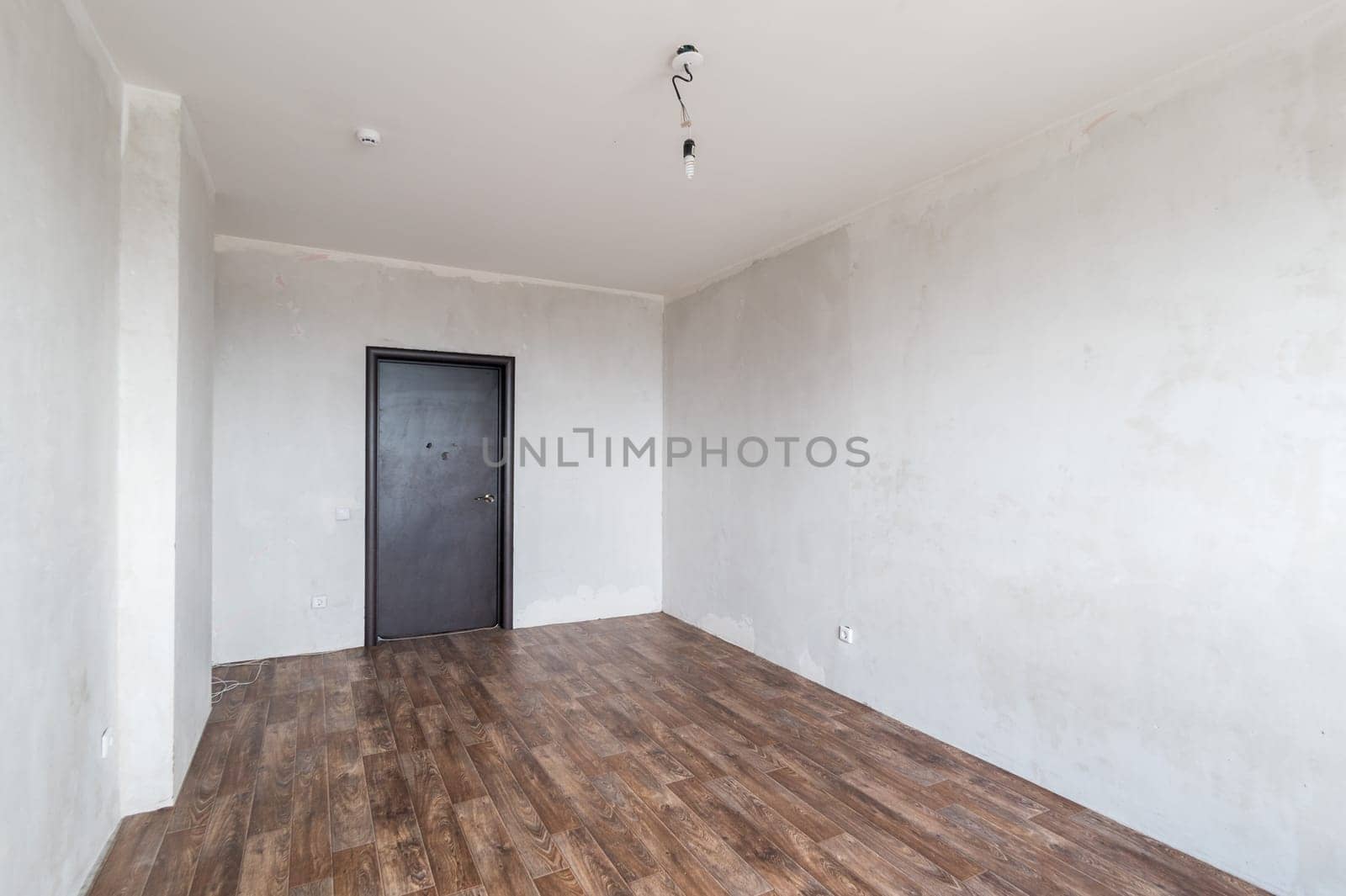 Russia, Moscow- June 11, 2019: interior room apartment. standard repair decoration in hostel. rough repair for self-finishing. finishing stage of construction