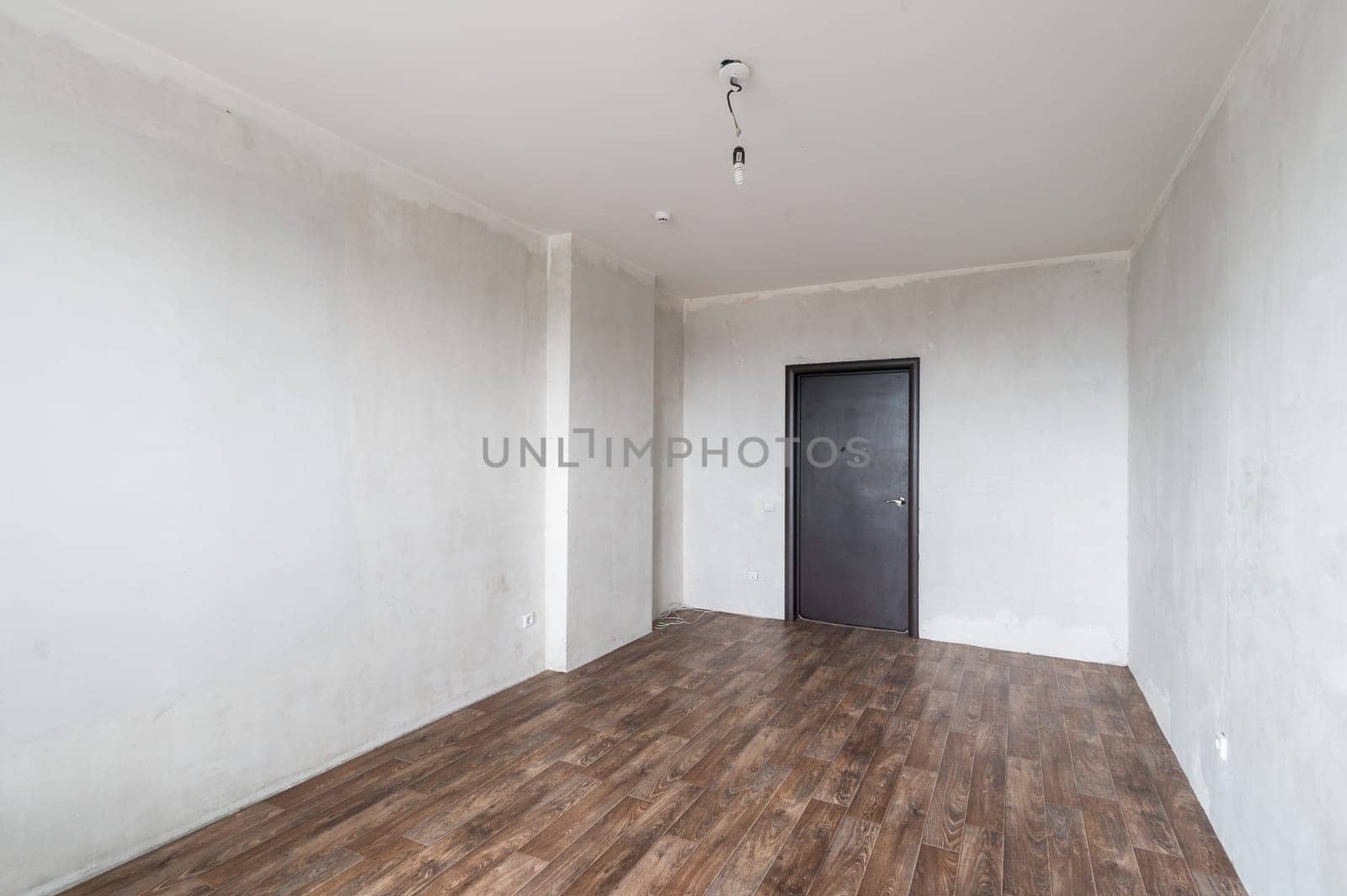 Russia, Moscow- June 11, 2019: interior room apartment. standard repair decoration in hostel. rough repair for self-finishing. finishing stage of construction