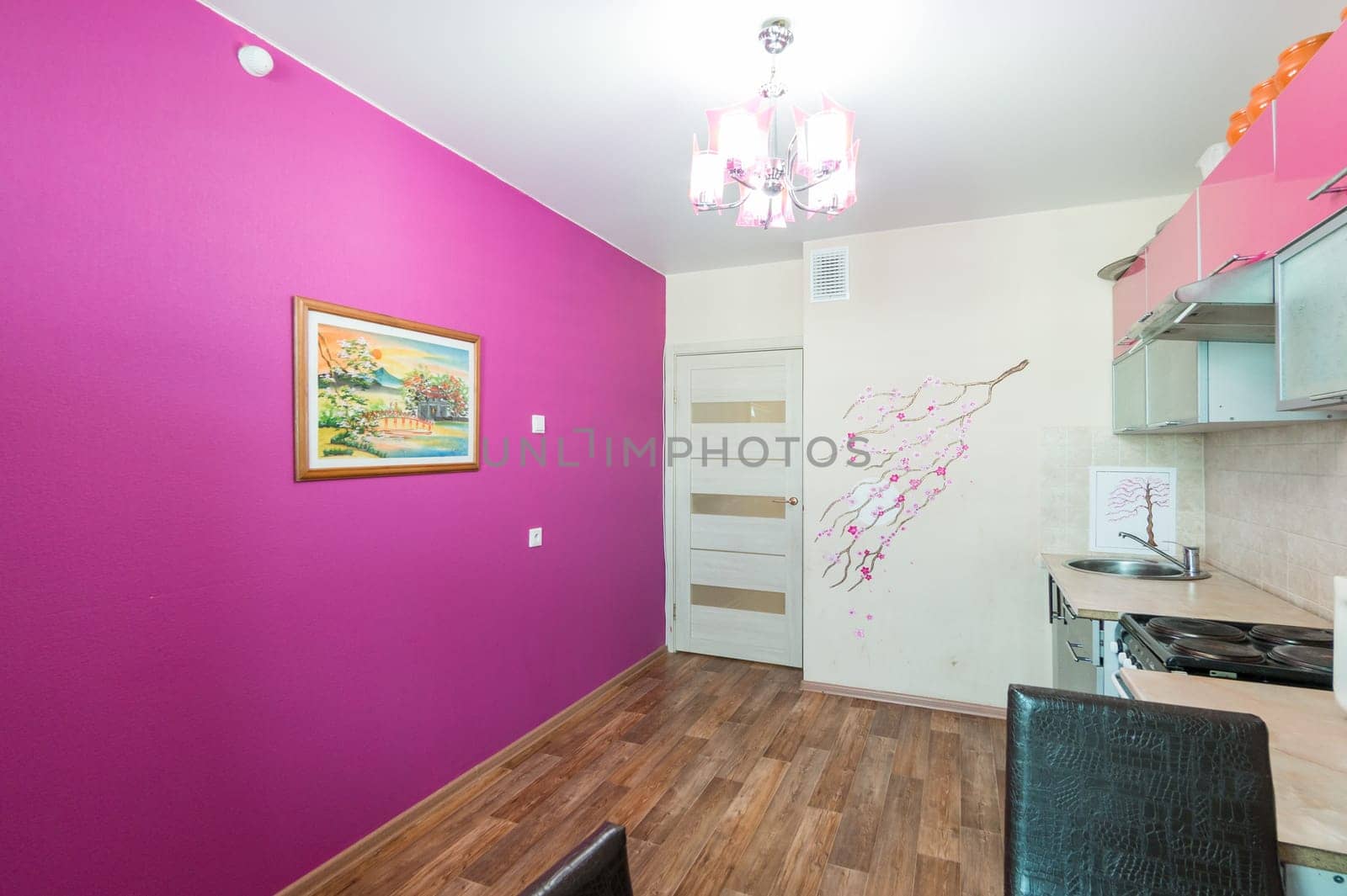 Russia, Moscow- June 11, 2019: interior room apartment. standard repair decoration in hostel. modern kitchen, dining area