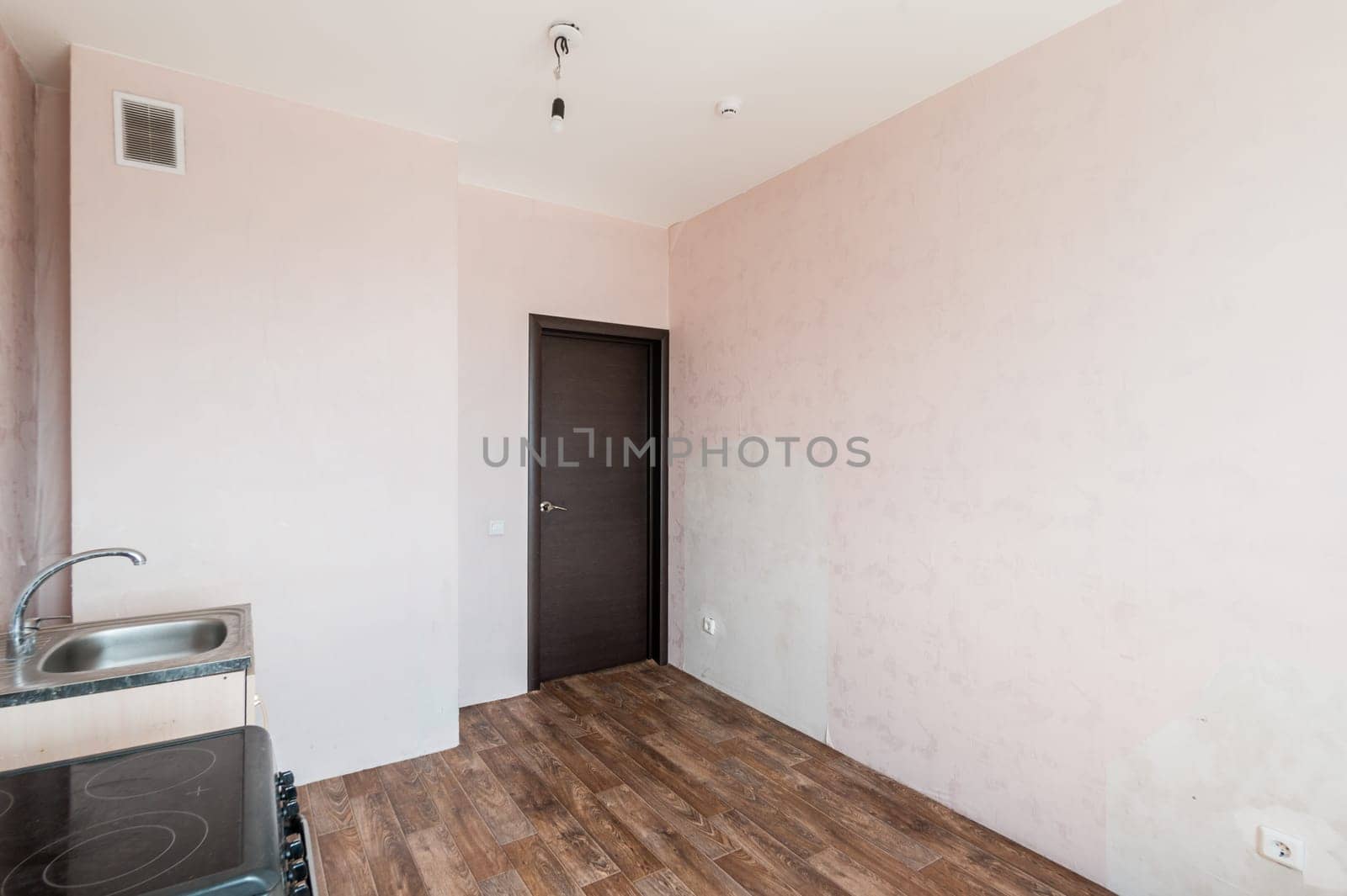 Russia, Moscow- June 11, 2019: interior room apartment. standard repair decoration in hostel. rough repair for self-finishing. finishing stage of construction