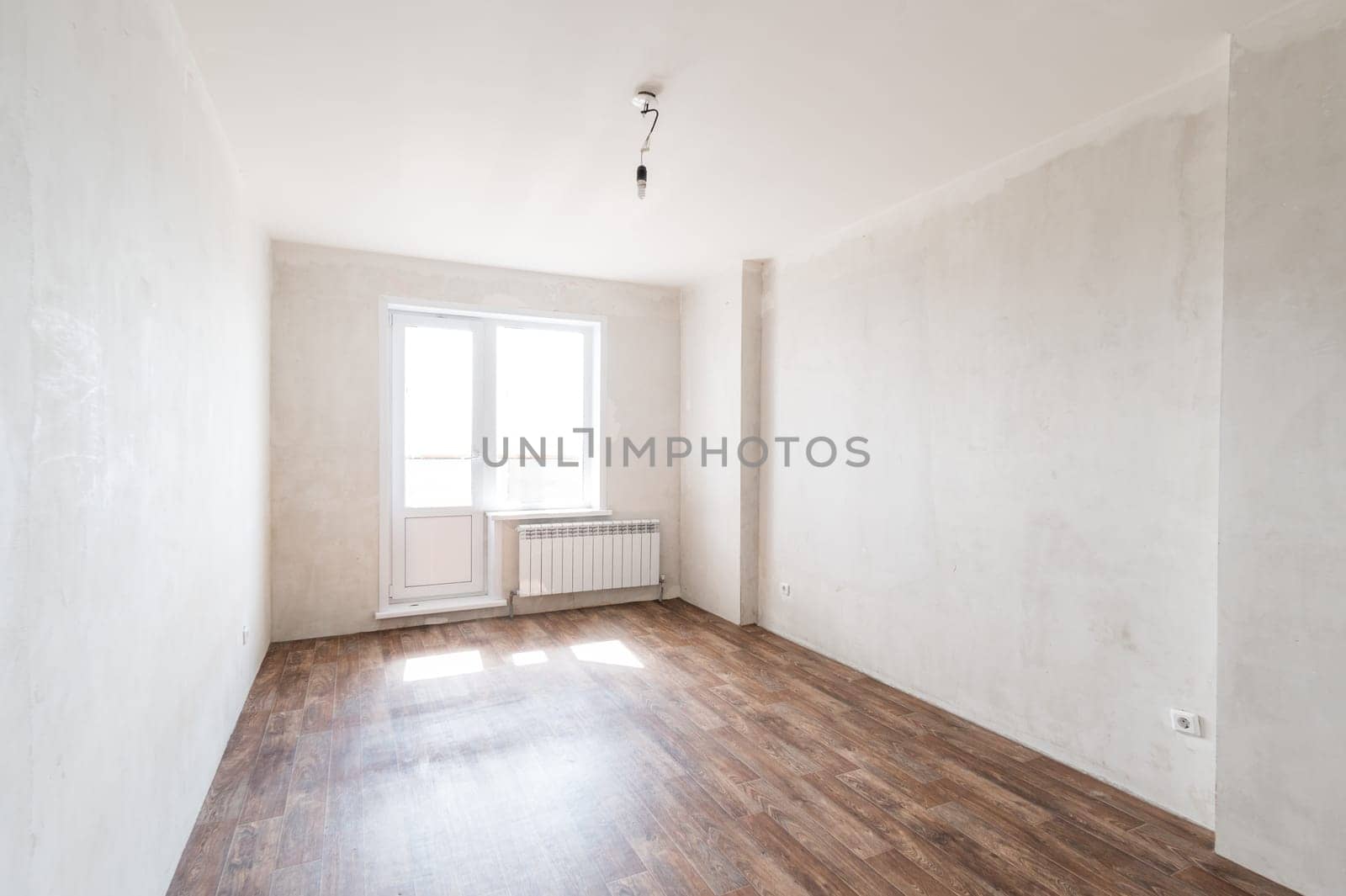 Russia, Moscow- June 11, 2019: interior room apartment. standard repair decoration in hostel. rough repair for self-finishing. finishing stage of construction