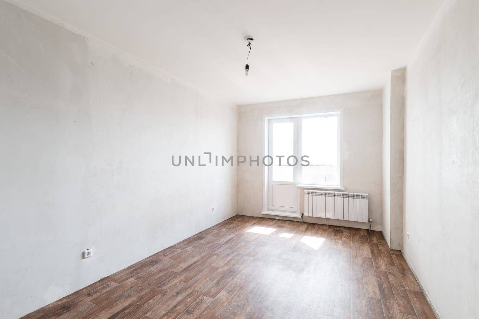 Russia, Moscow- June 11, 2019: interior room apartment. standard repair decoration in hostel. rough repair for self-finishing. finishing stage of construction
