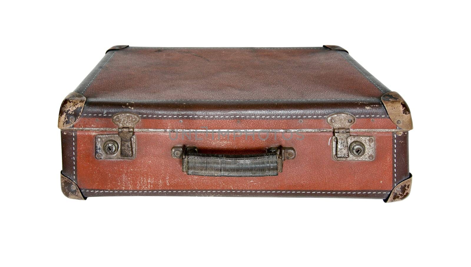 Old worn traveling suitcase on white background