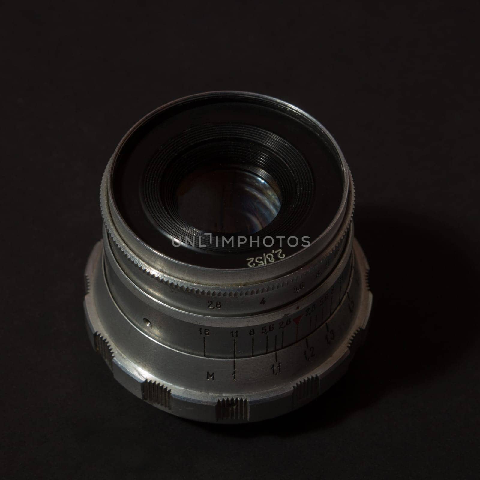 Retro Camera Lens on the black background