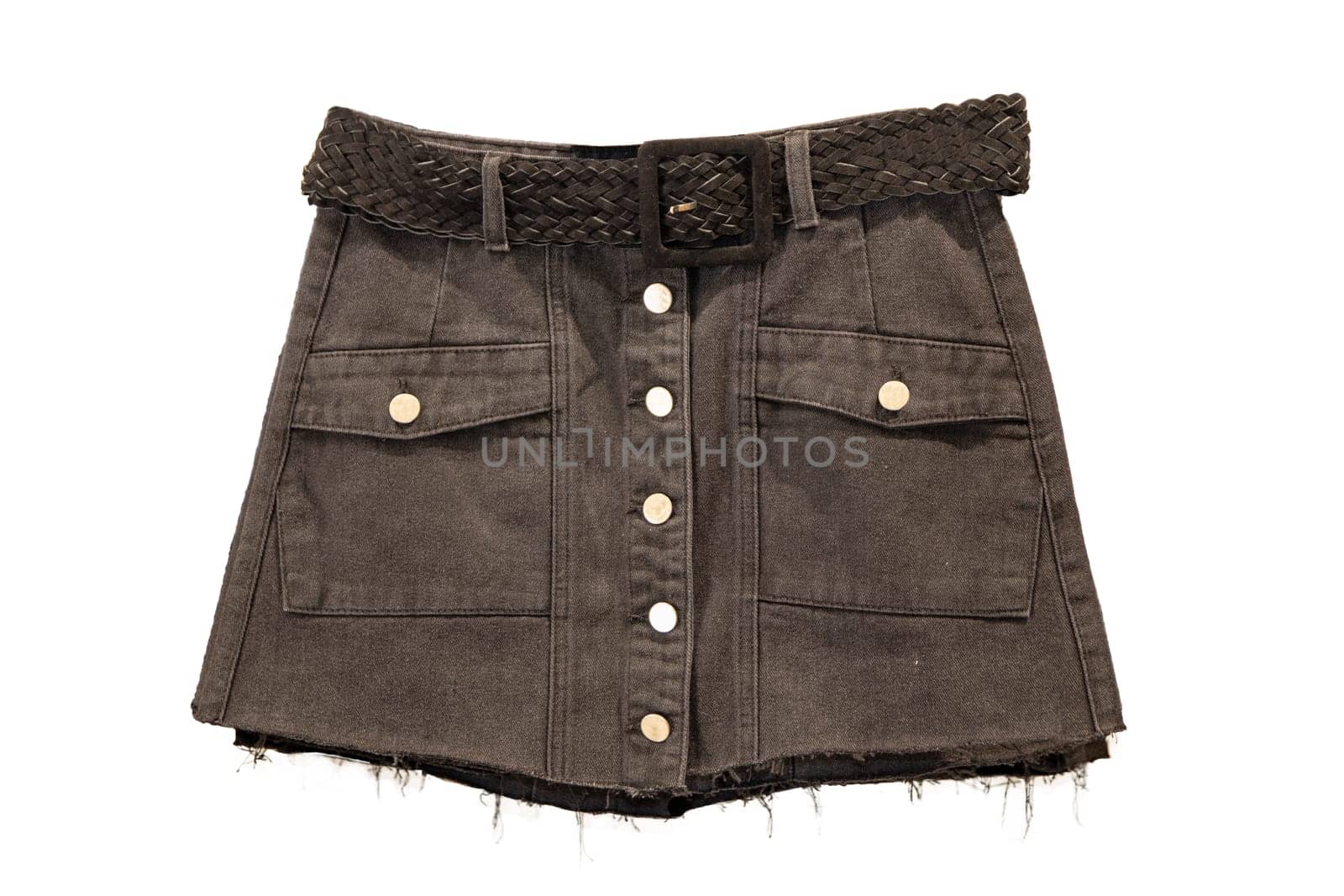 Jeans skirt. Close-up of sexy short brown jeans skirt with a elegant brown leather belt isolated on a white background. Denim fashion for girls.
