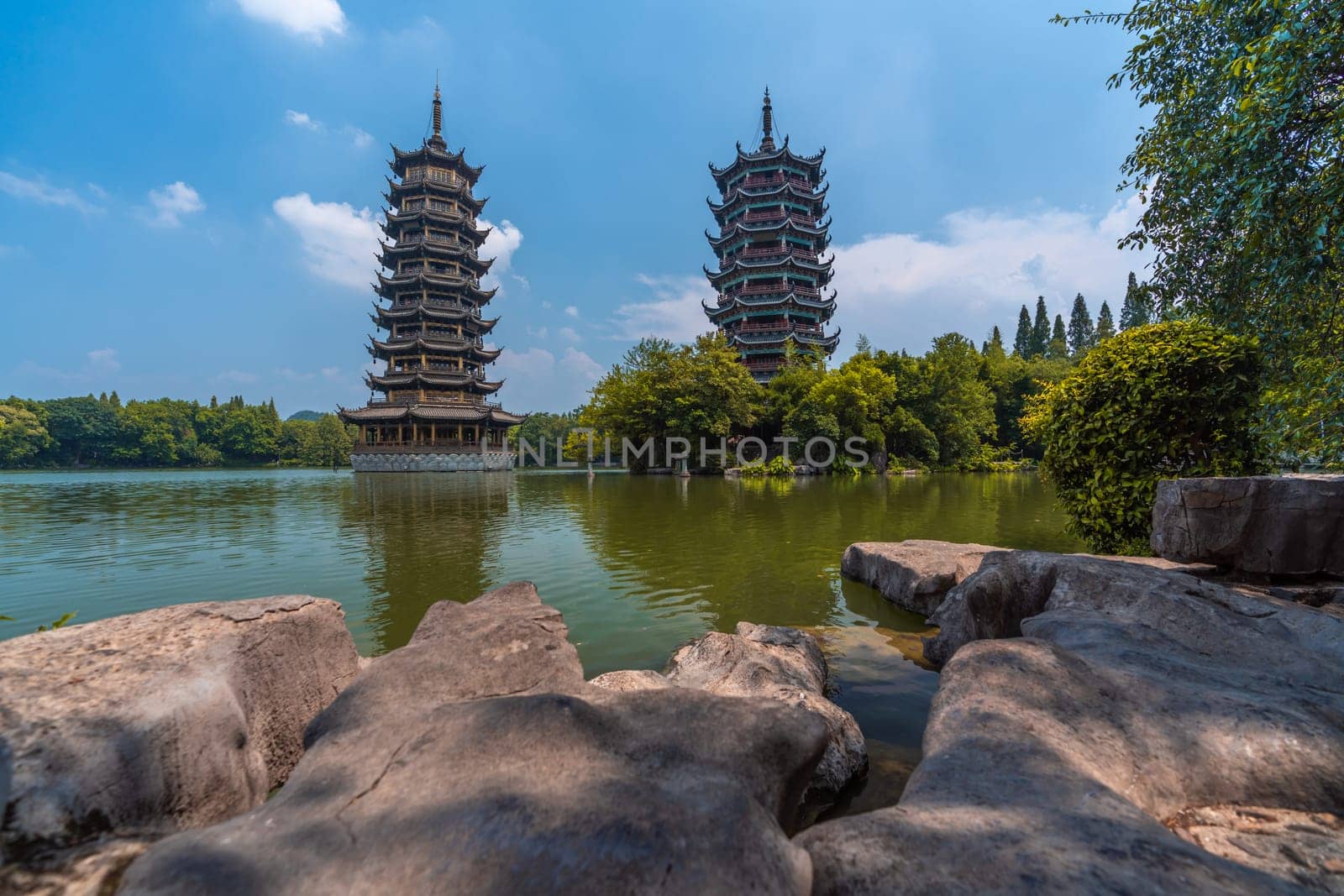 Sun and Moon Pagodas Towers at Shanhu or Shan Lake in Guilin town, Guangxi Province, China