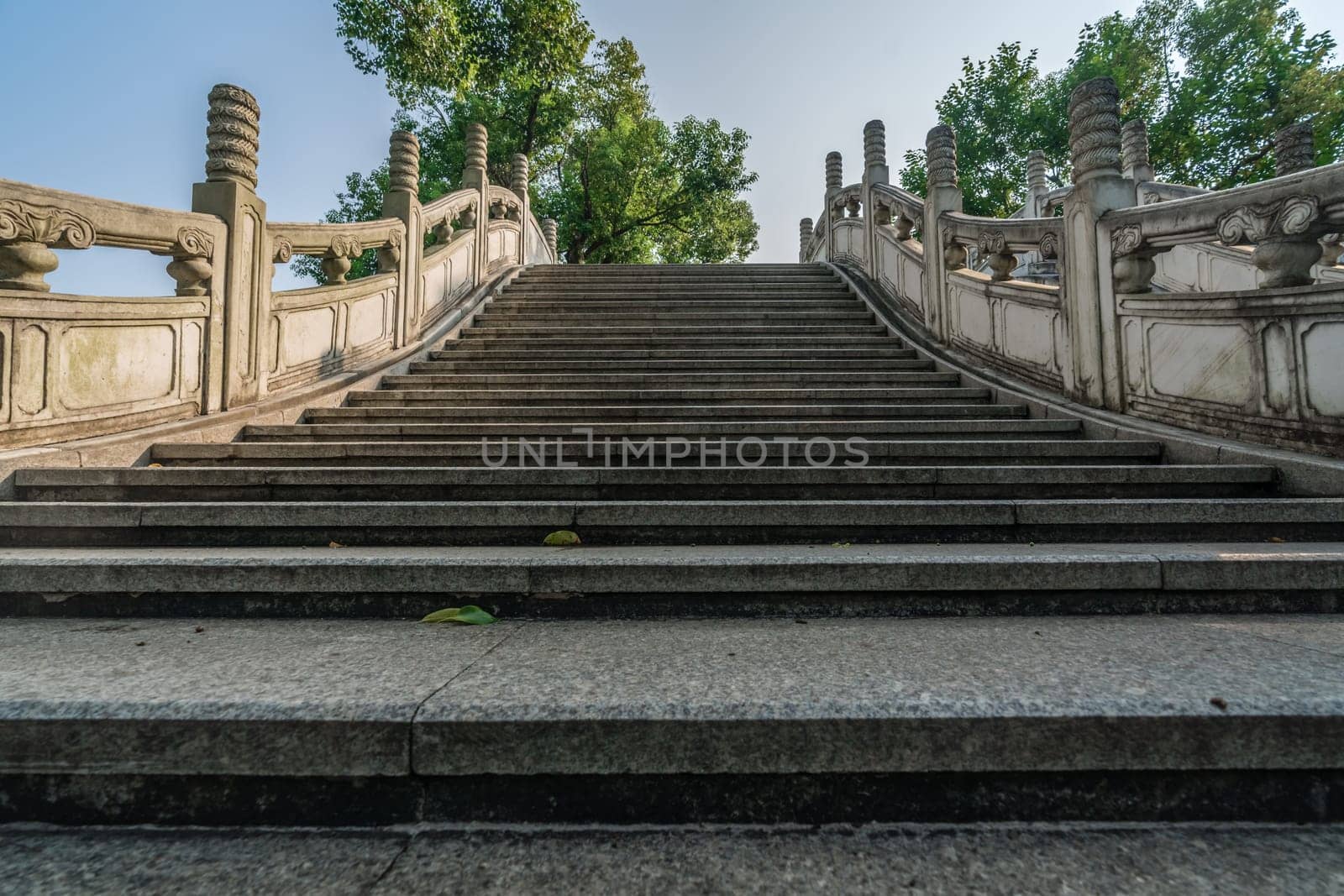 Empty wide stairs of marble bridge on Shan Lake, Guilin town, Guangxi Province, China