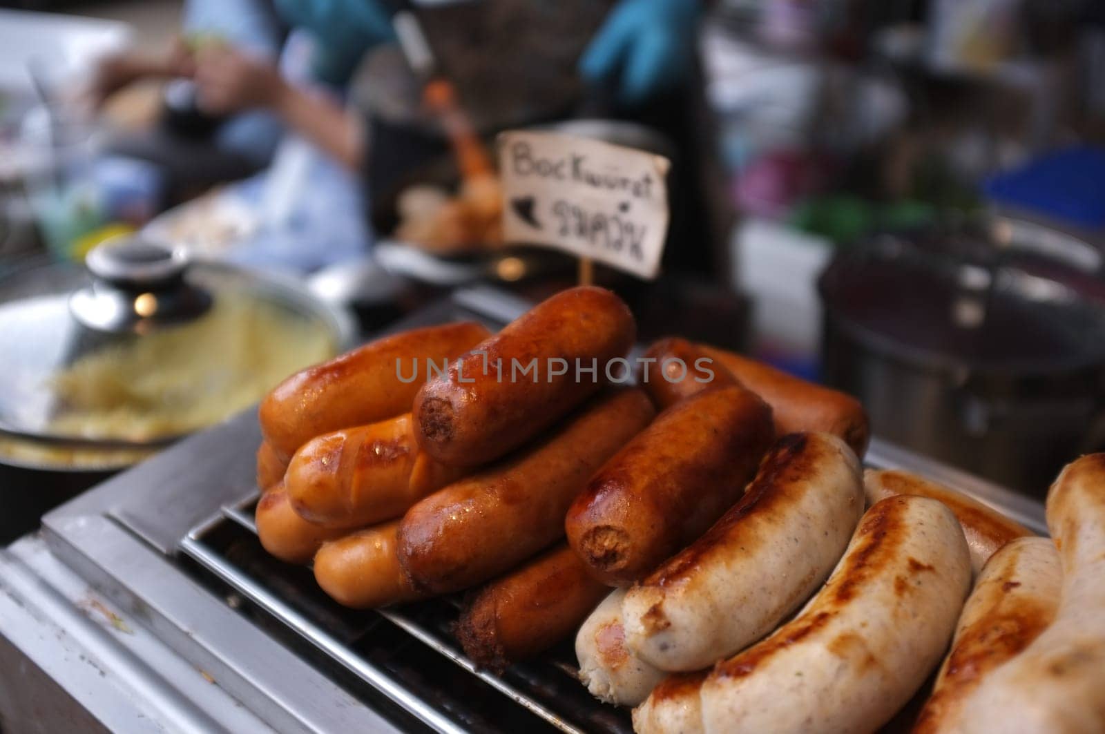 Delicious  Grilled sausages using torch.