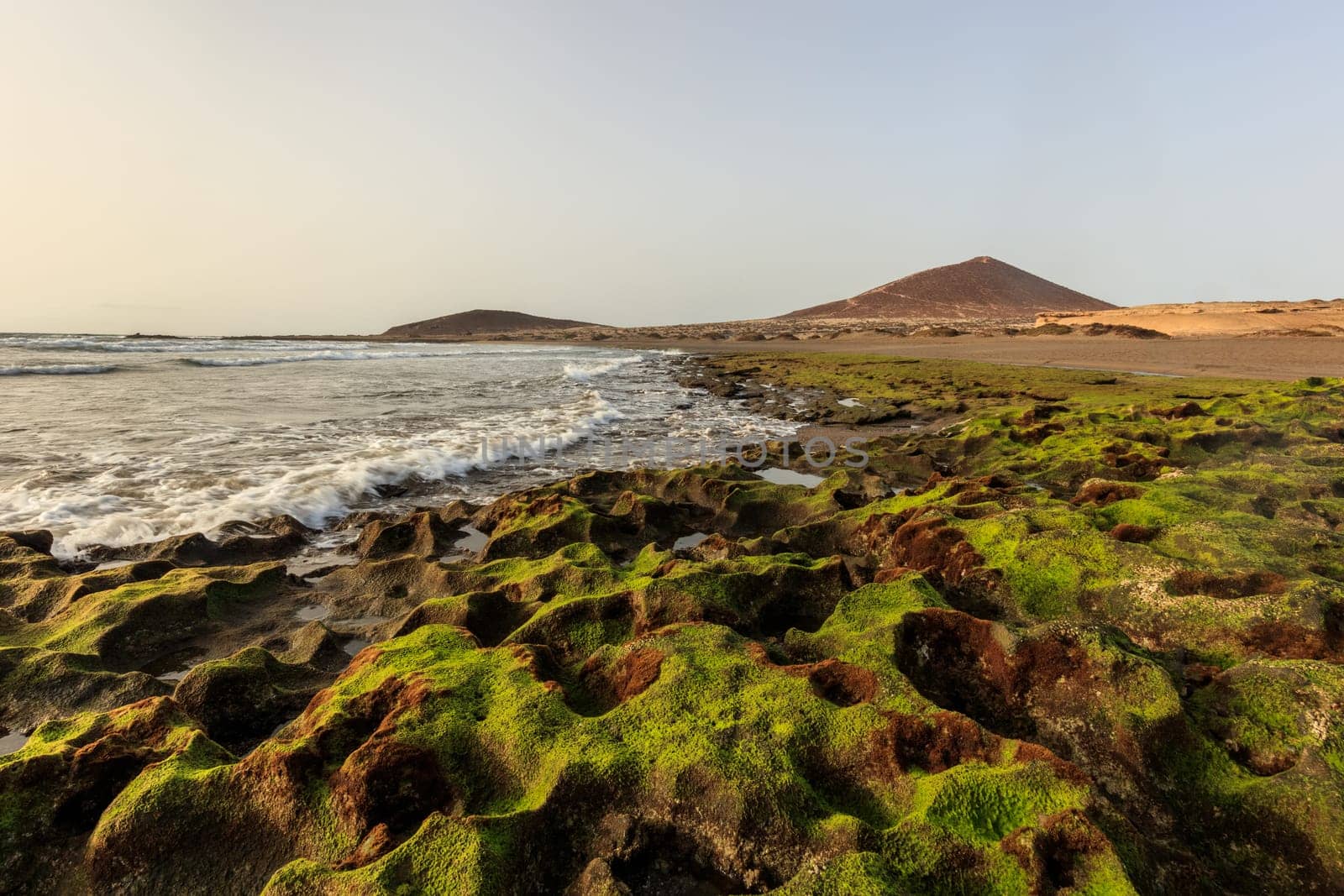 El Medano beach, in background La Montana Roja, Tenerife island, Spain