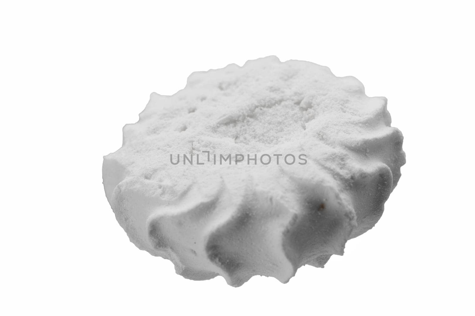 Levitating white meringues closeup on a white background