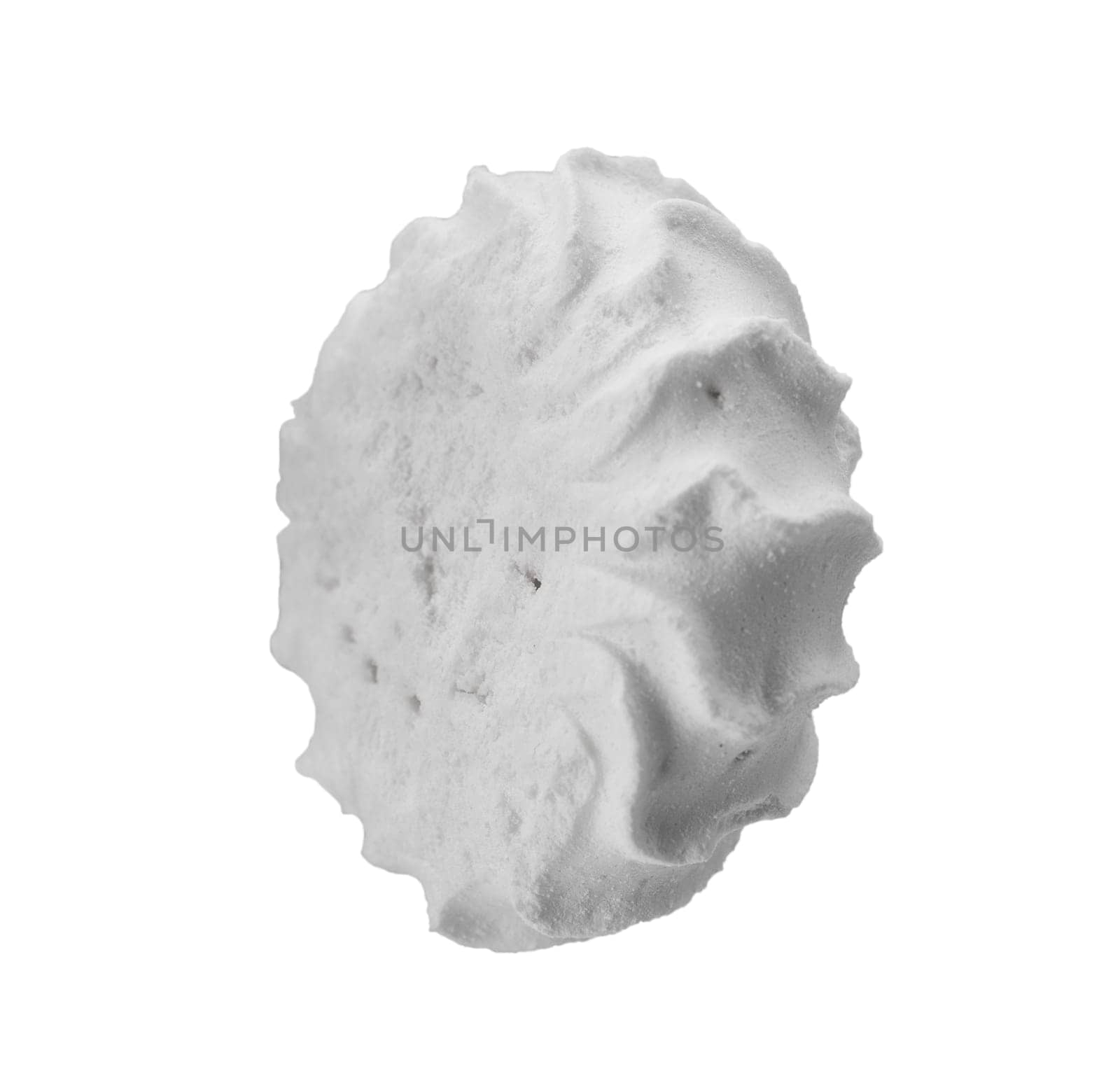 Levitating white meringues closeup on a white background