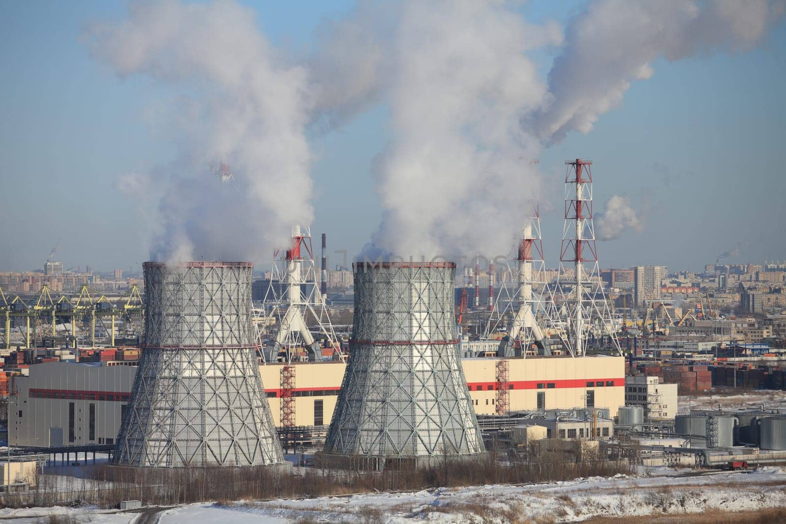St. Petersburg, Russia, March 5, 2018.  thermal power plant cooling tower in the foreground, cold winter weather