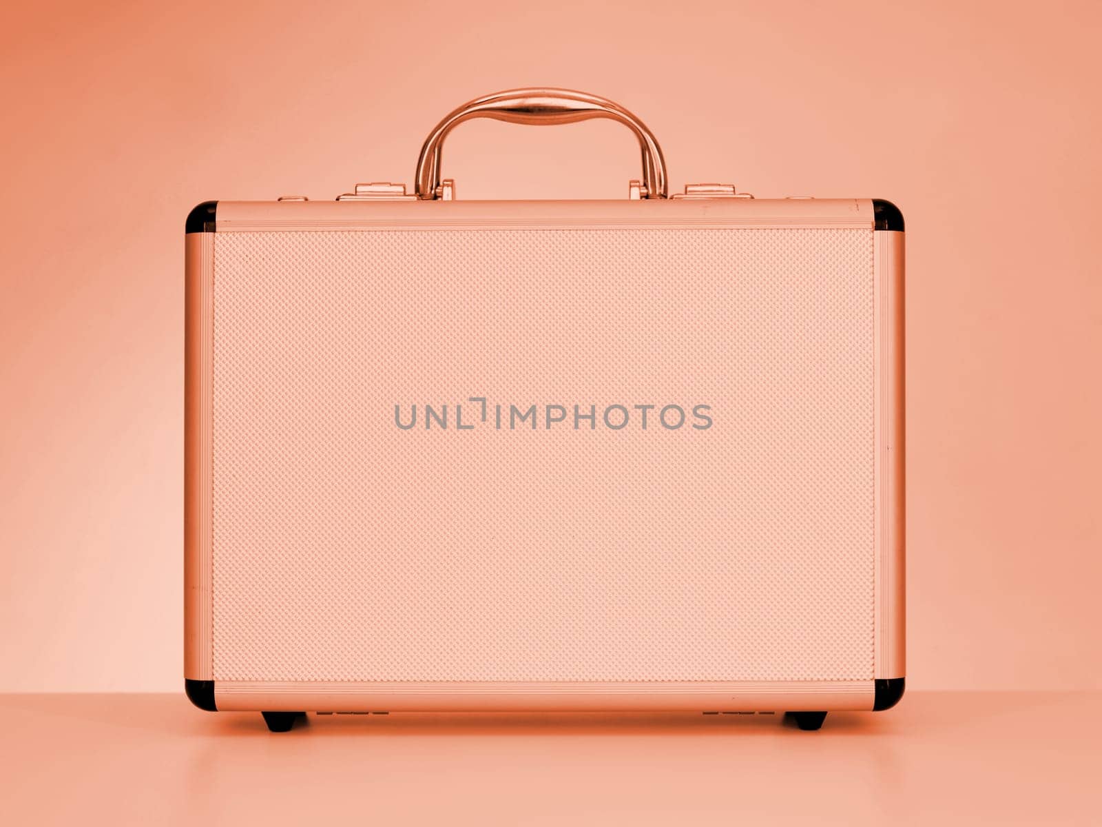 A close up shot of a metal brief case