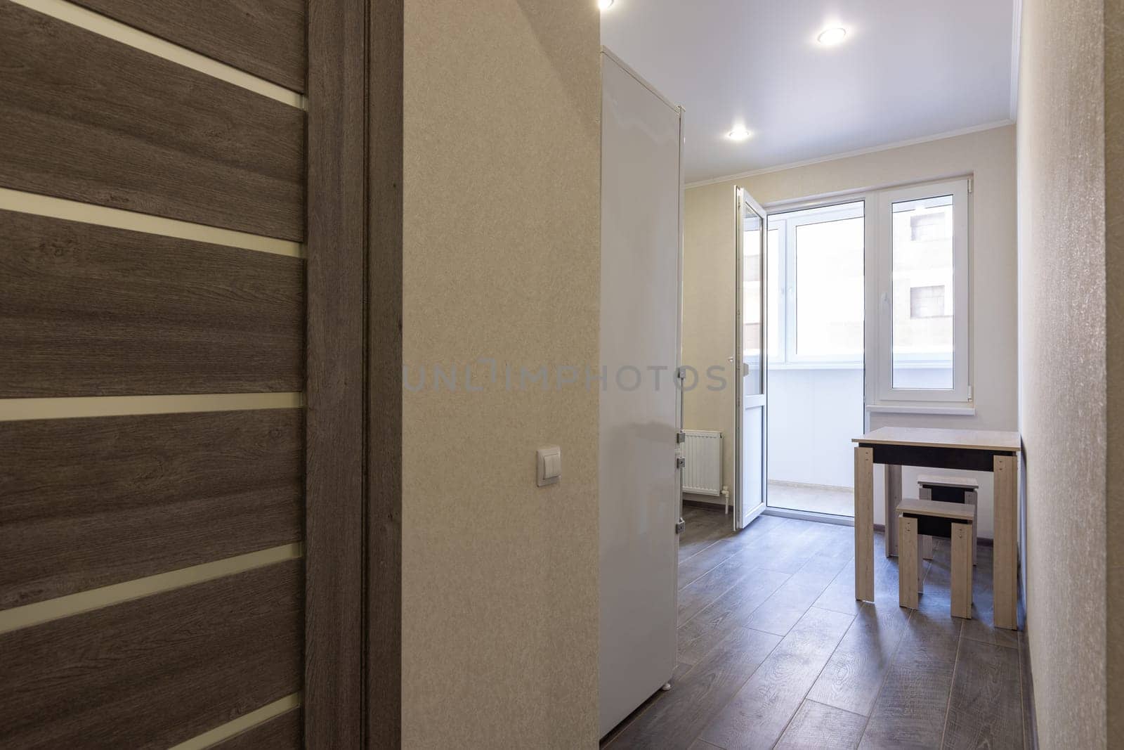 Access to the kitchen in a studio apartment