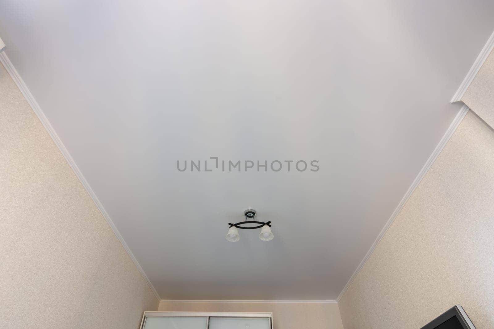 Stretch ceiling in the interior of the room