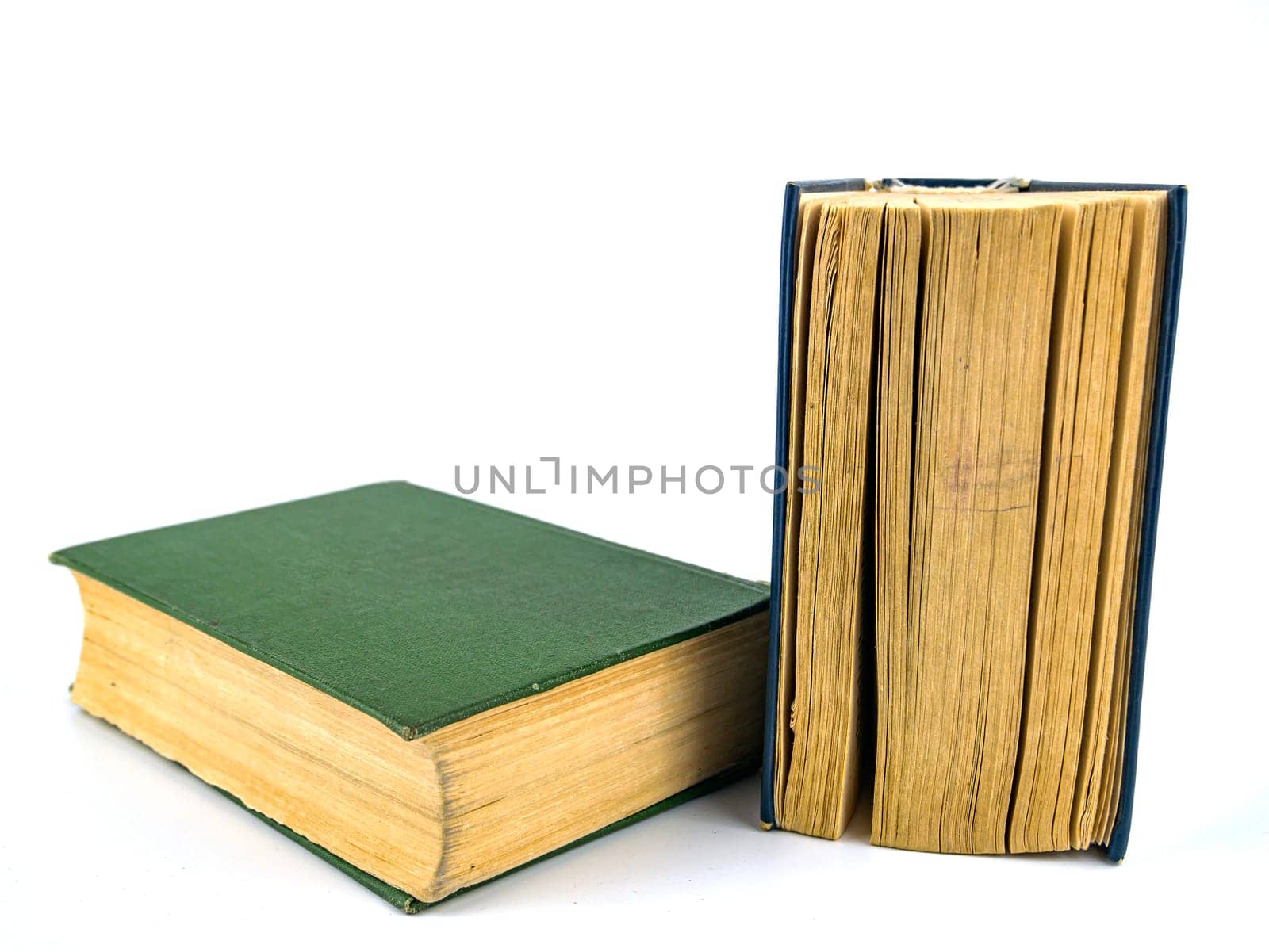 Old books on a white background. Book pages. Place for text.