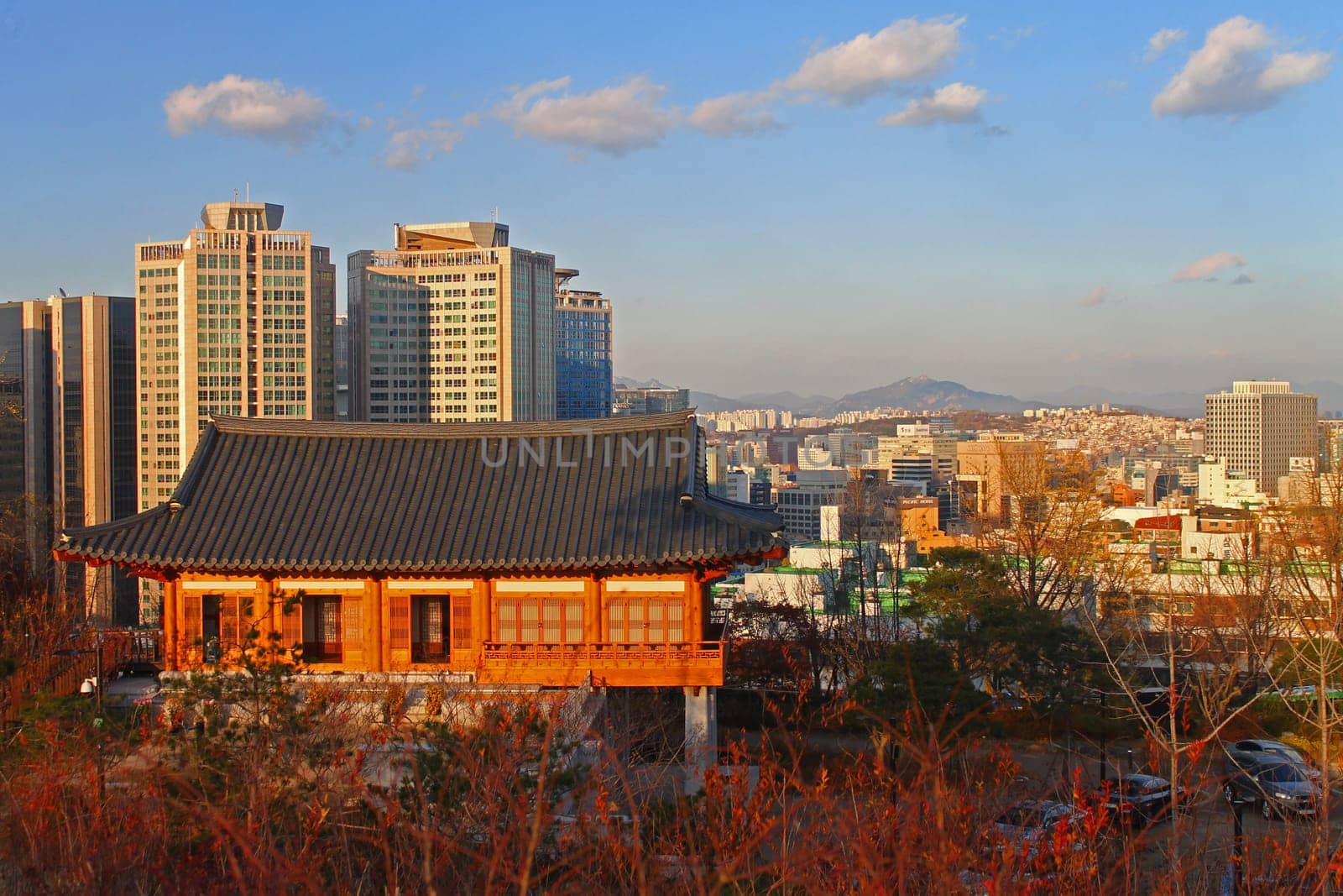 The sunset on the pagoda and the skyscrapers