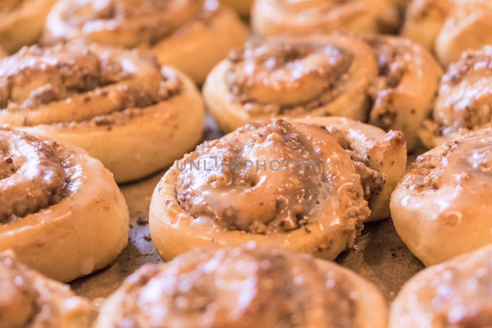 Delicious leavened dough pastries for breakfast, dessert or brunch. Yummy juicy backed traditional goods from bakery or confectionery.
