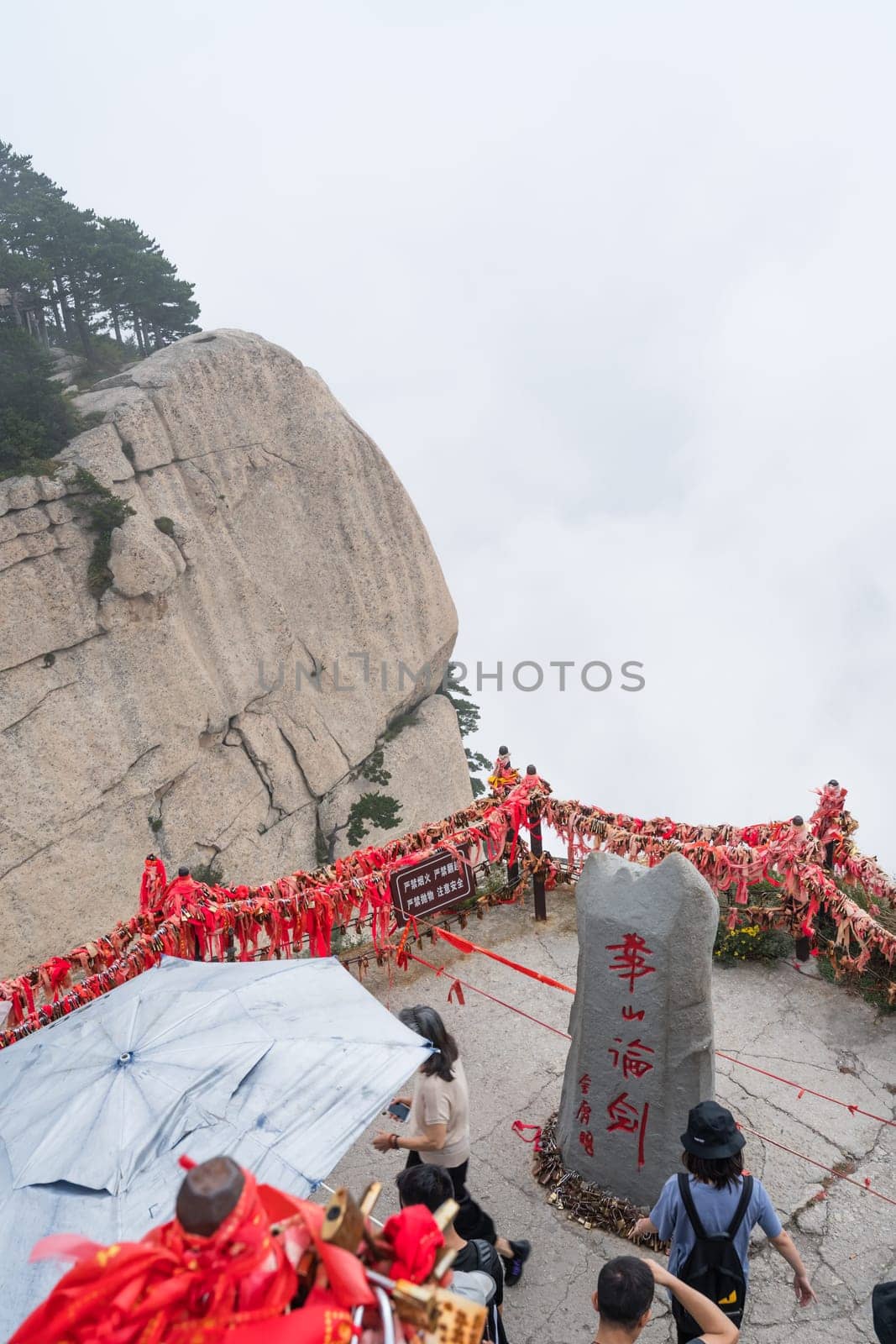 Huashan, China -  August 2019 : View of the stunning mountain landscape from the scenic lookout located between West and South Peaks on Huashan mountain, Xian, Shaanxi Province