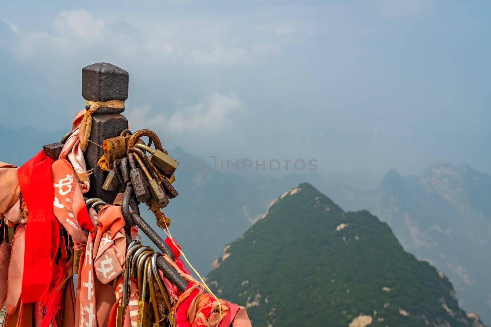 Huashan, China -  August 2019 : View of the stunning mountain landscape from the summit of West Peak on Huashan mountain, Xian, Shaanxi Province
