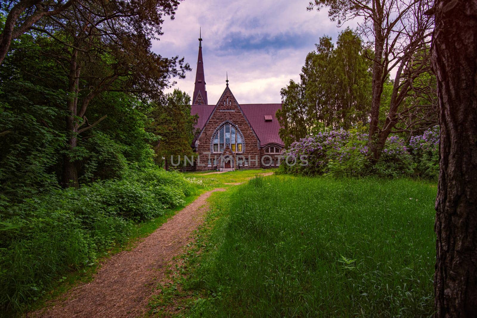 Old finnish church Koiviston kirkko in Primorsk city of Russia at sunset. Travel in europe.