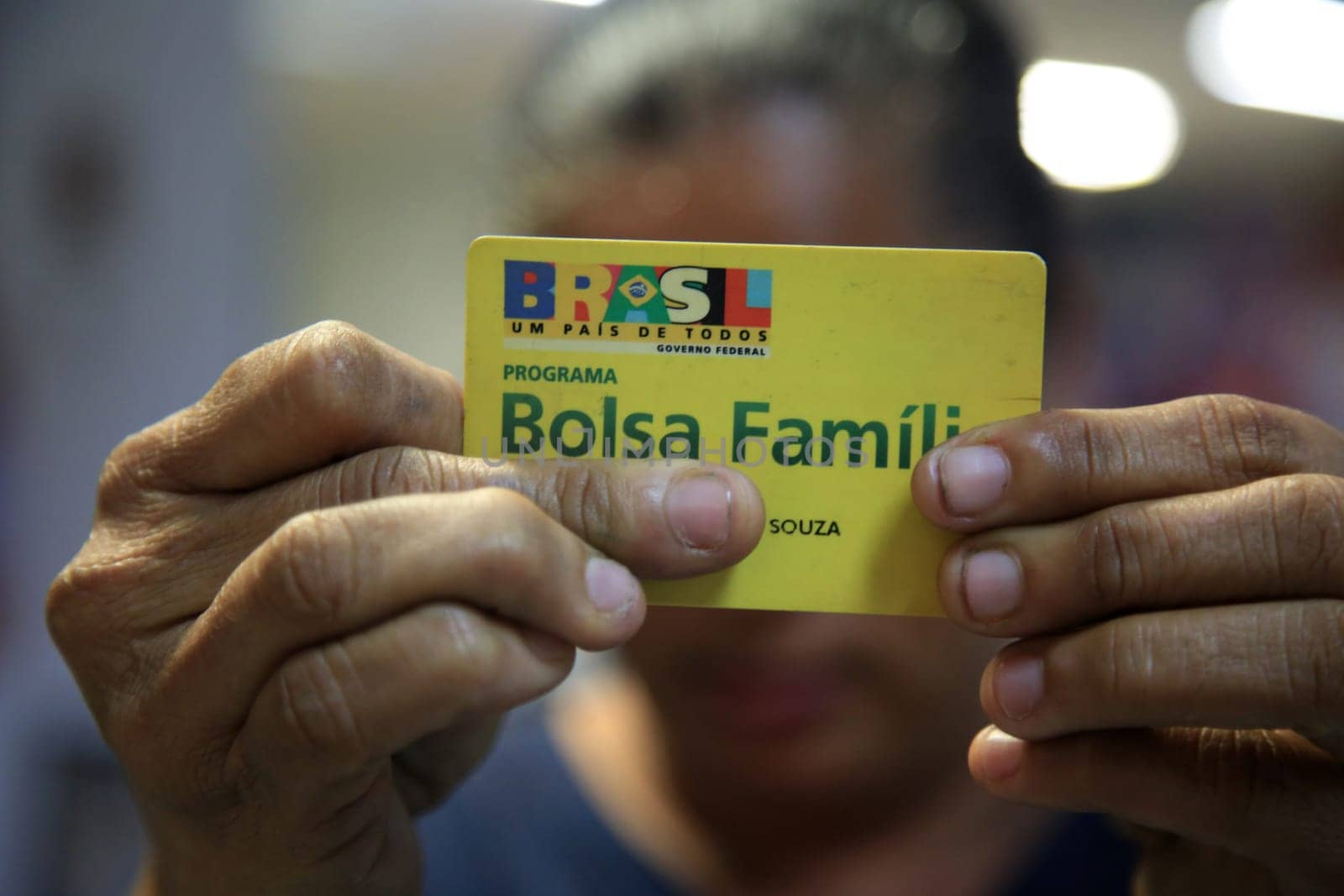 SALVADOR, BAHIA / BRAZIL - August 11, 2017: Family Allowance Card is seen as a user of the social benefit provided by the Federal Government of Brazil. (Joa Souza / Panthermedia).