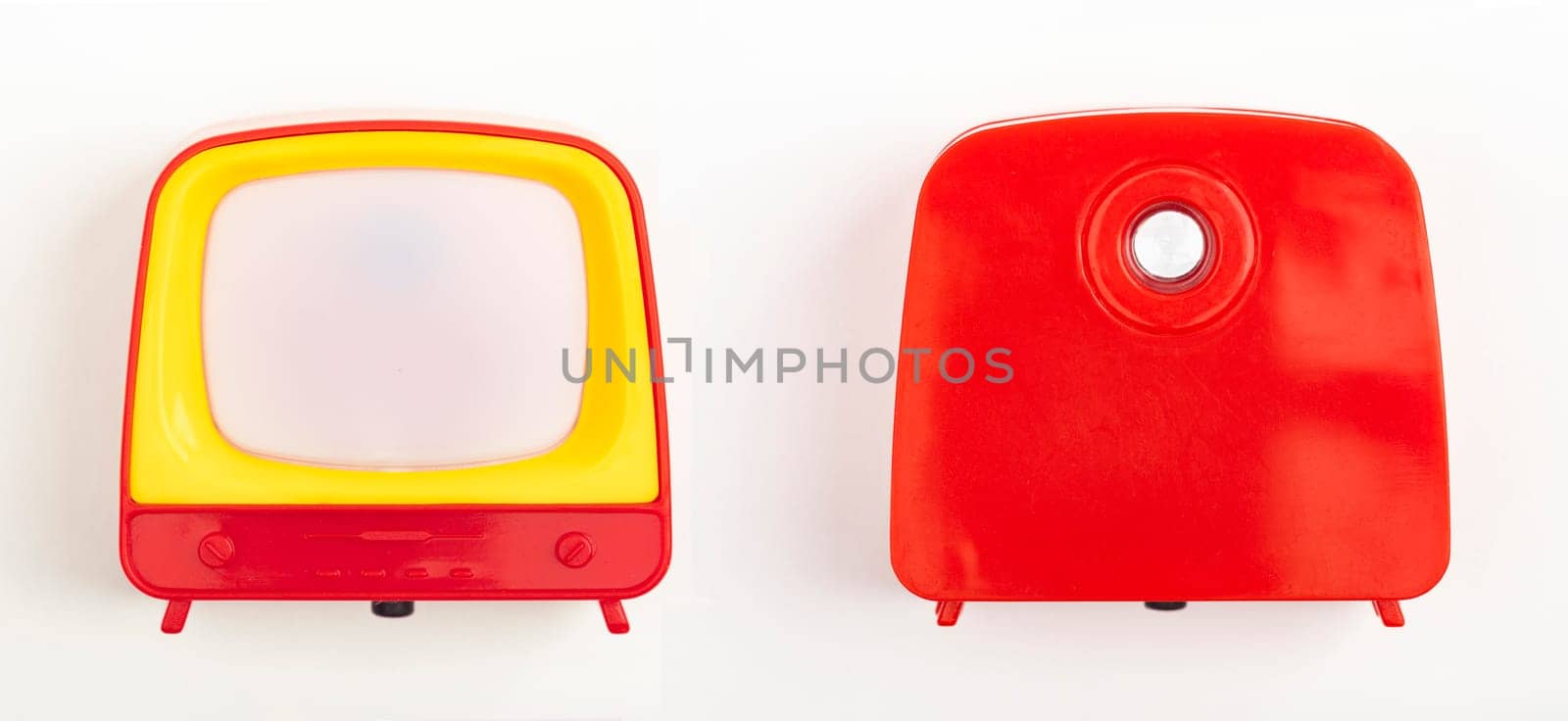Front and backside from miniature Toy Television on white background
