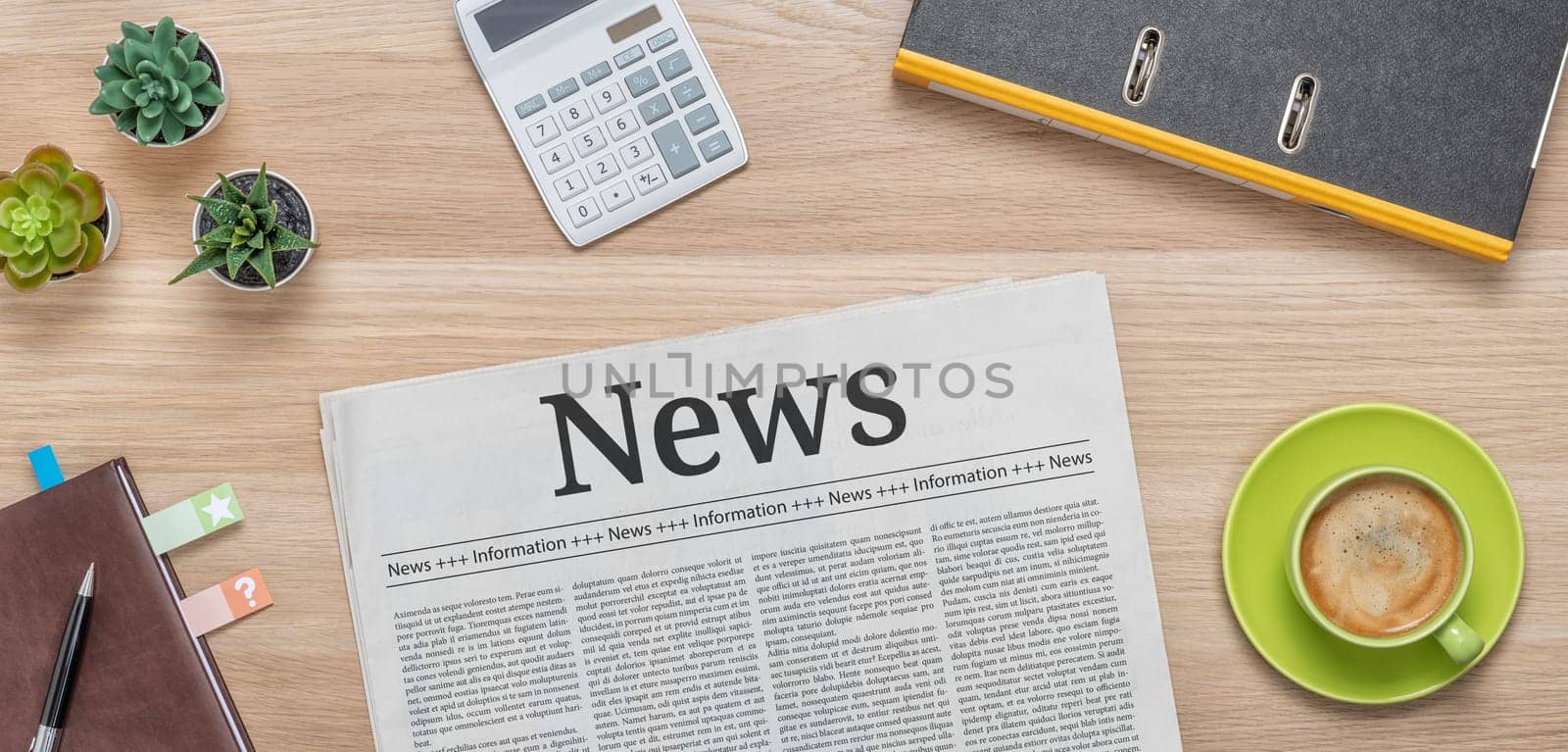 A newspaper on a desk with the headline News