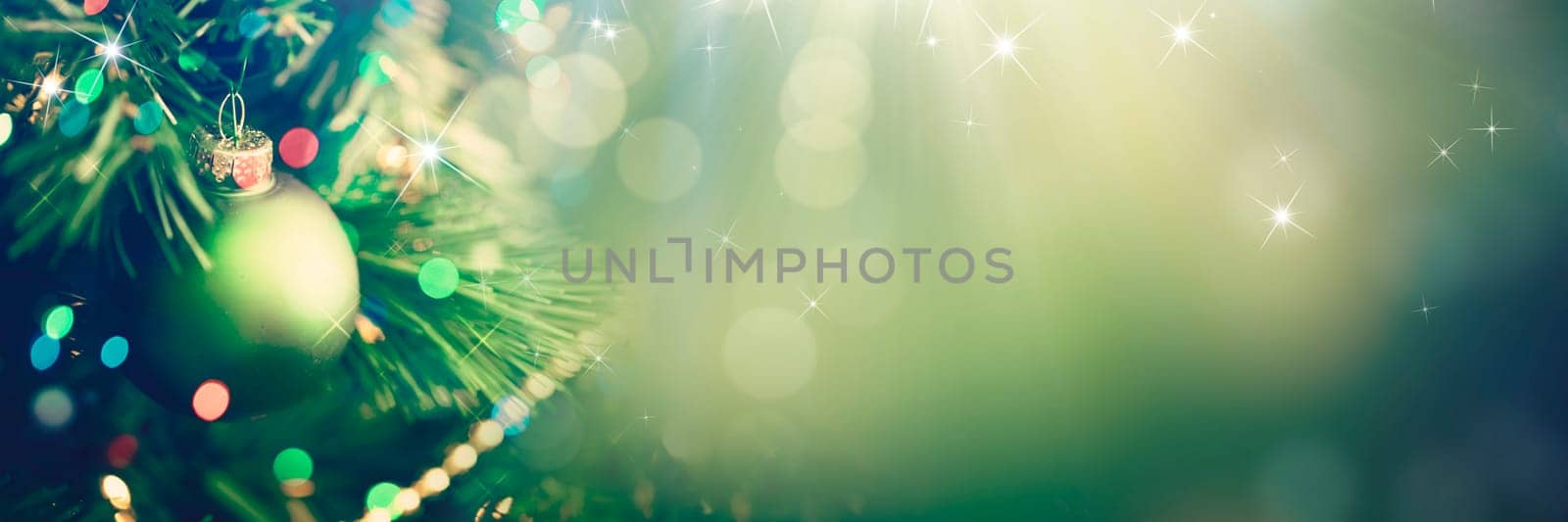 Decorated Christmas tree on glowing background
