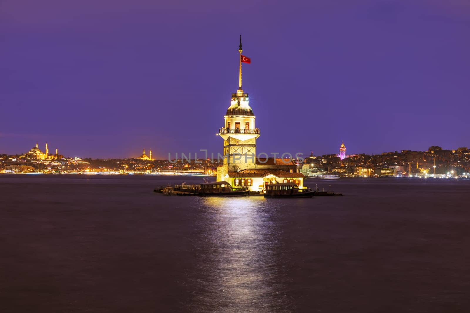 Maiden's Tower of Istanbul in evening lights, Tirkey.