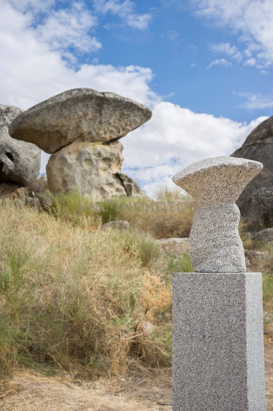 Senses route at Natural Monument of Los Barruecos. Track suitable for blind people Scale models of Mushroom-shaped granite formation, Caceres, Spain