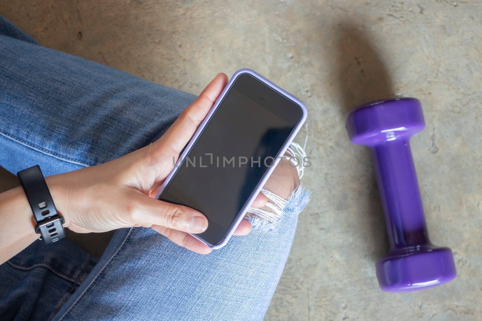 Healthy lifestyle concept female wearing sport tracker wristband arm, stock photo