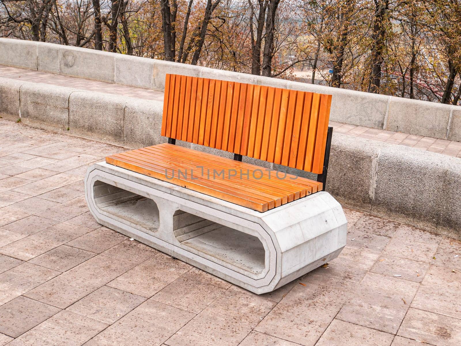 Bench for relaxing in a public park. Place for text. Background.