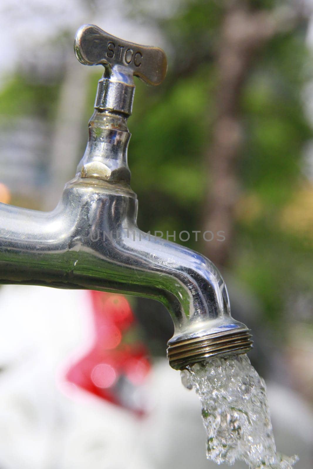 SALVADOR, BAHIA / BRAZIL - September 27, 2013: Faucet pours the last drops of water due to lack of supply.