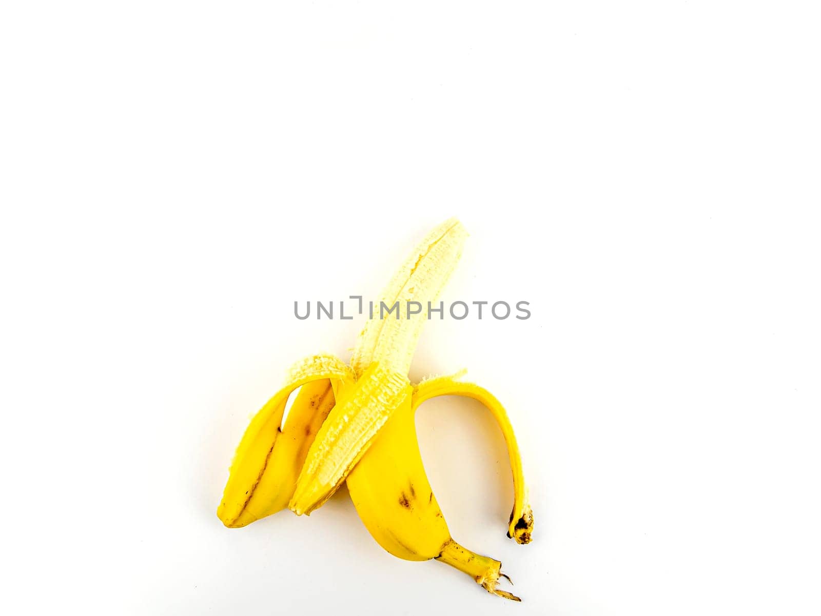 Yellow bananas on a white background. Place for text.